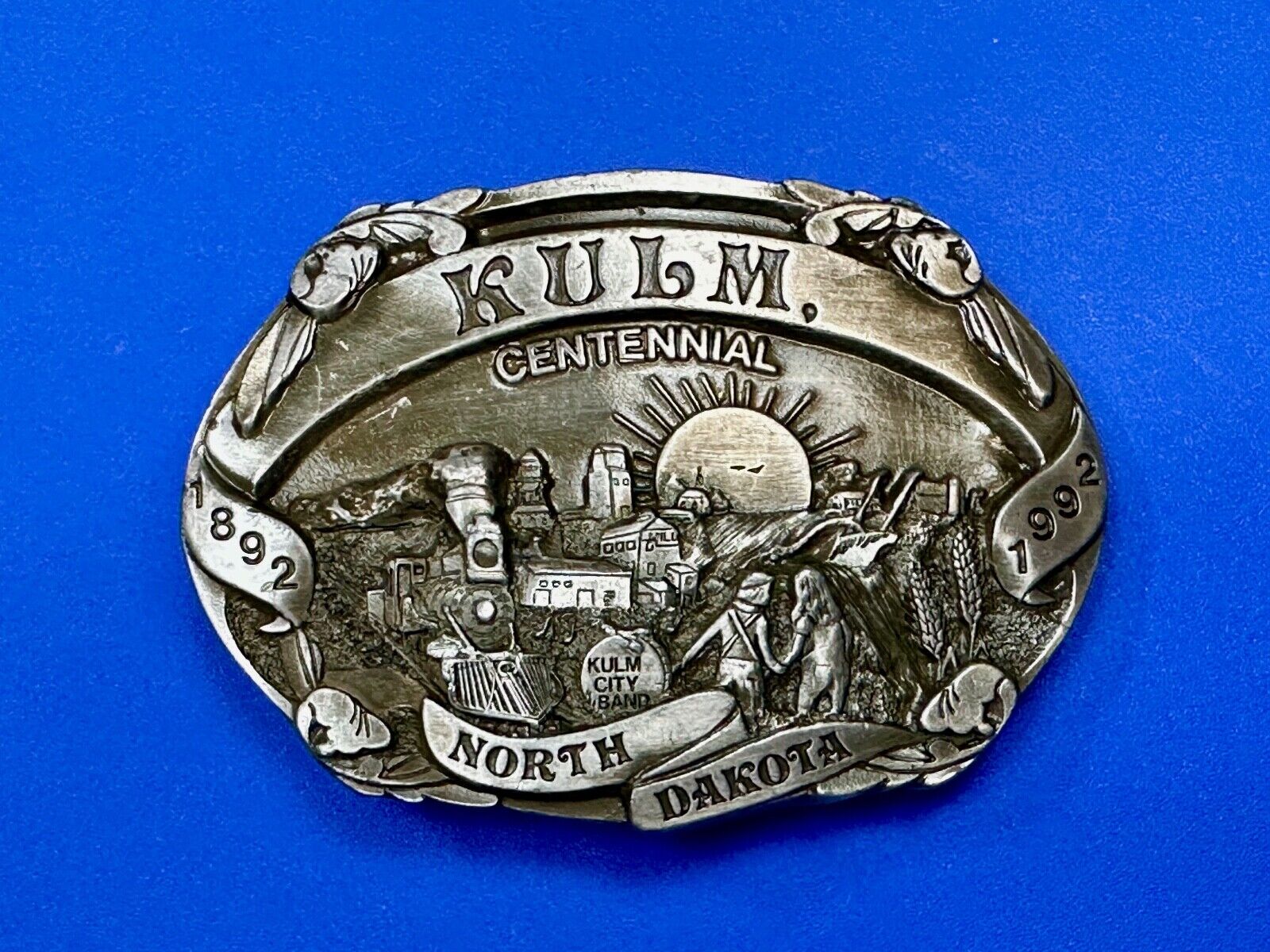 Vintage KULM North Dakota commemorative belt buckle by DART inc.