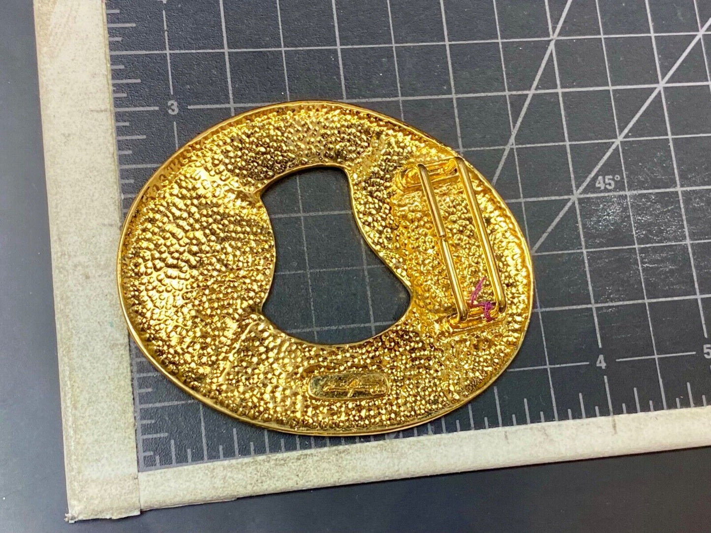 Artist Ginnie Johansen signed gold color abstract oval scarf slide