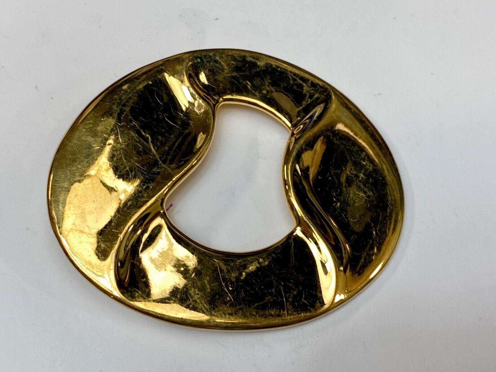 Artist Ginnie Johansen signed gold color abstract oval belt scarf slide
