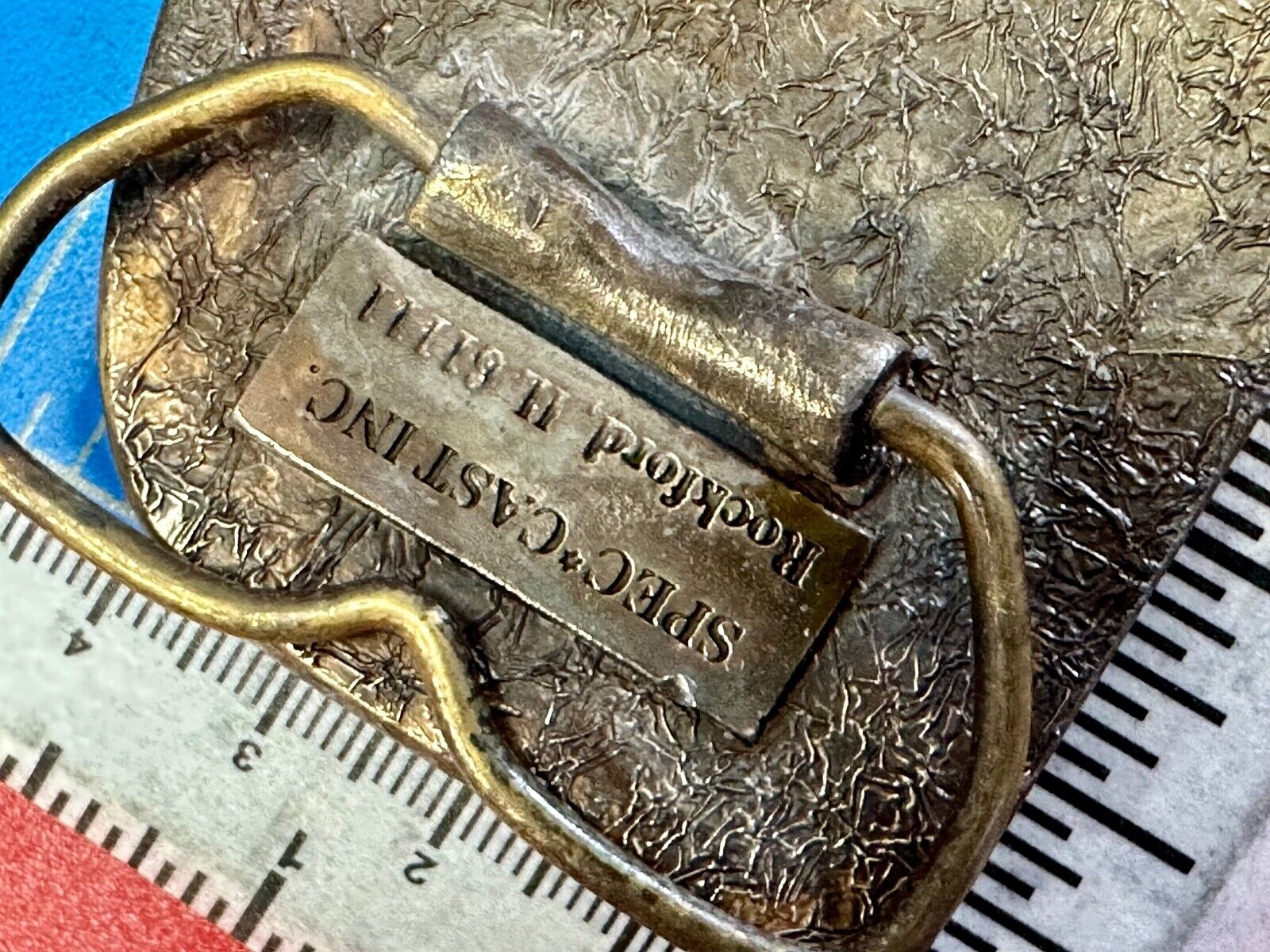 The Tough Tire Team BRi Brad Ragan, Inc. vintage belt buckle by Spec-Cast