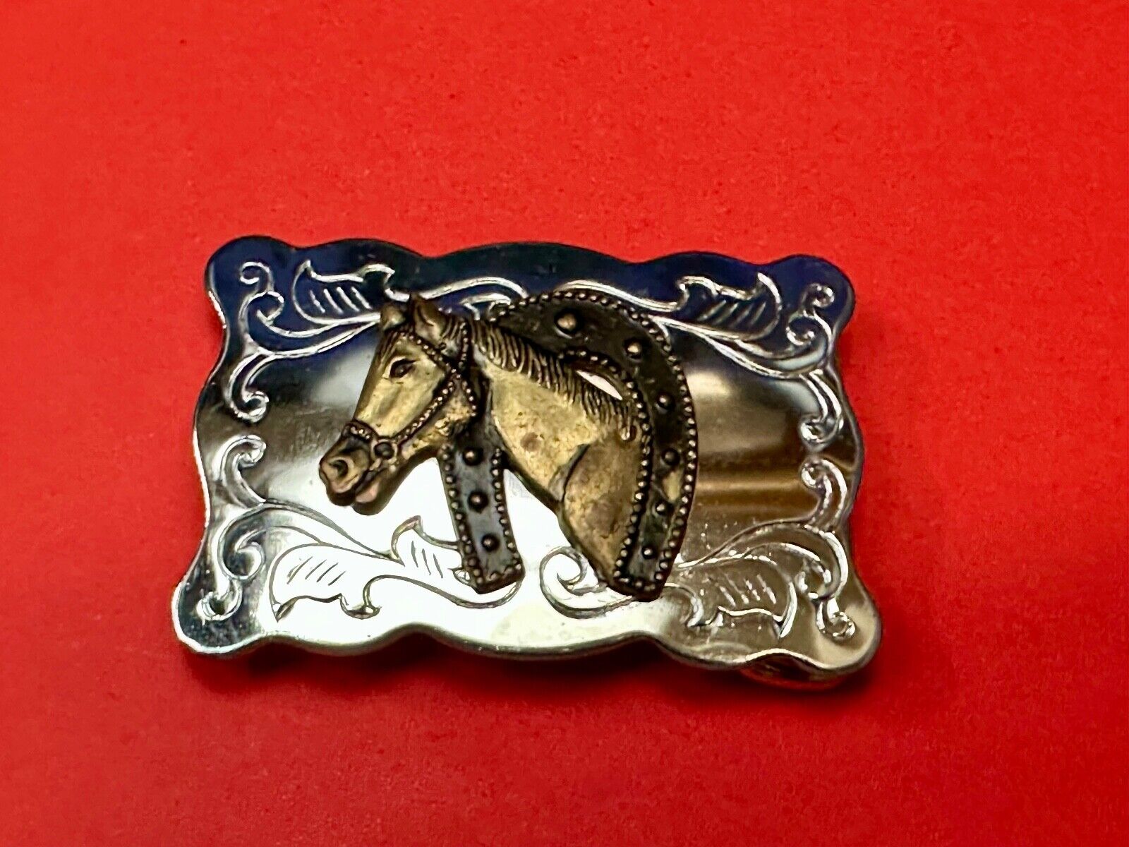Vintage lucky horseshoe with head centerpiece on western two tone belt buckle