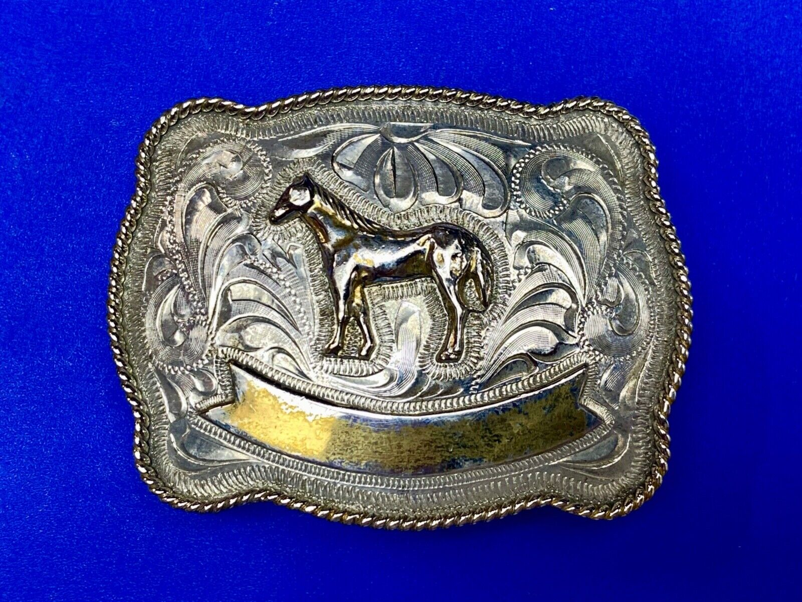 Vintage HORSE western Justin Boot Company belt buckle with Award Ribbon