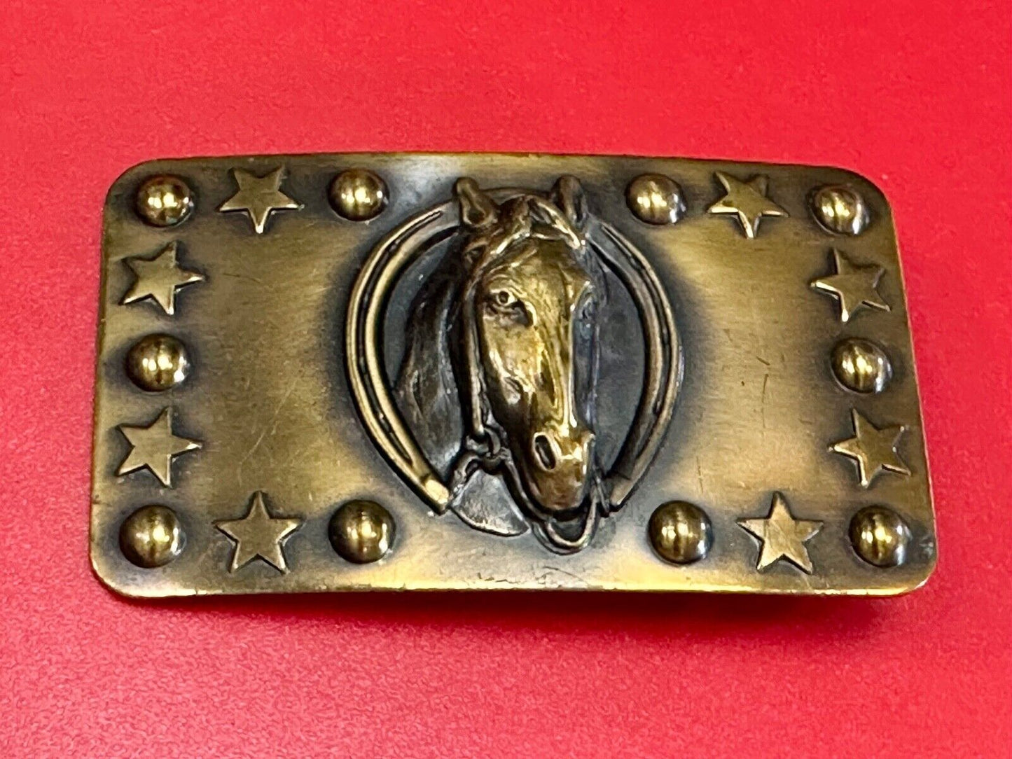 Vintage Horse head belt buckle with stars and circles boarder