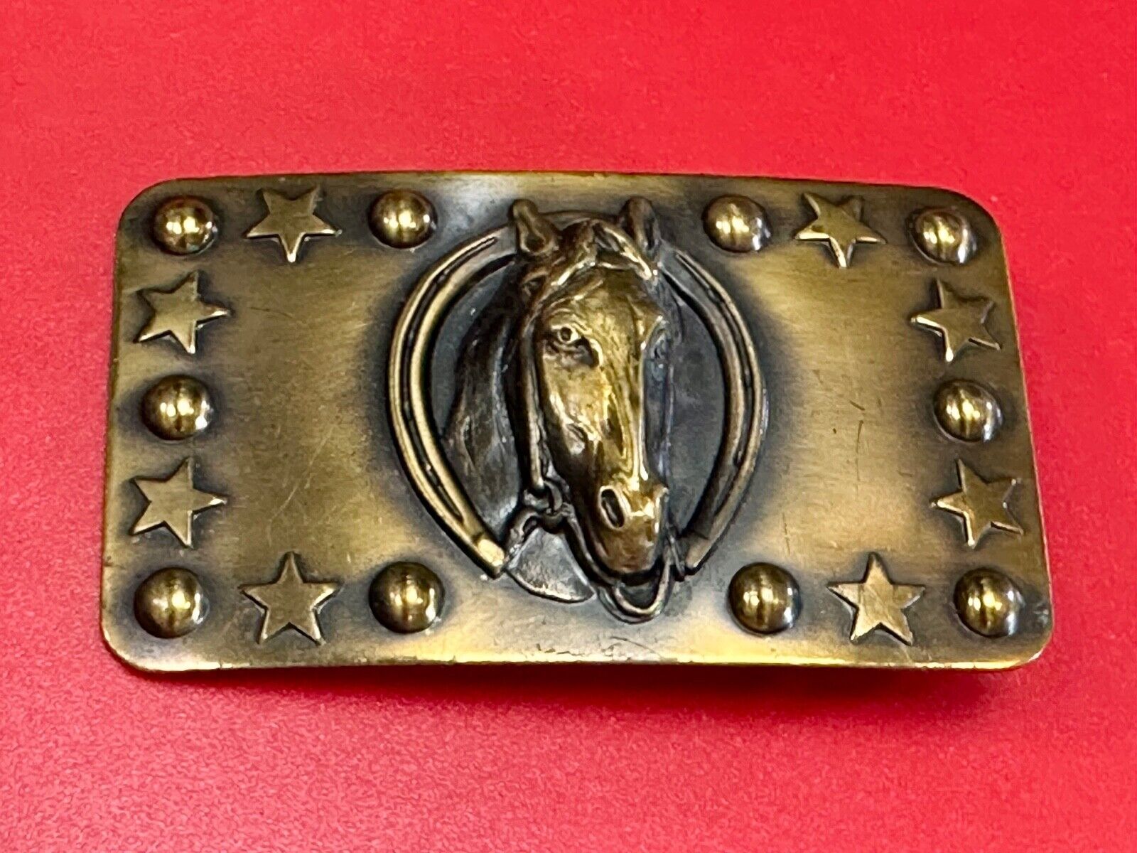 Vintage Horse head belt buckle with stars and circles boarder