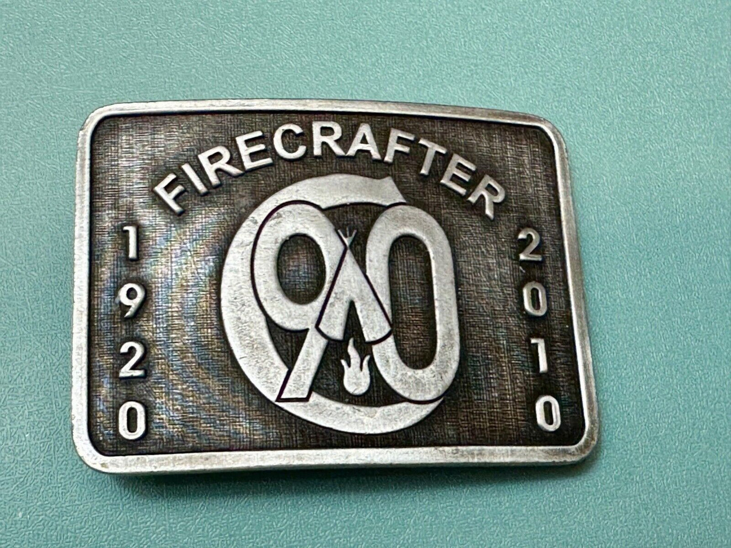 1920 - 2010 Firecracker 90 year celebration belt buckle