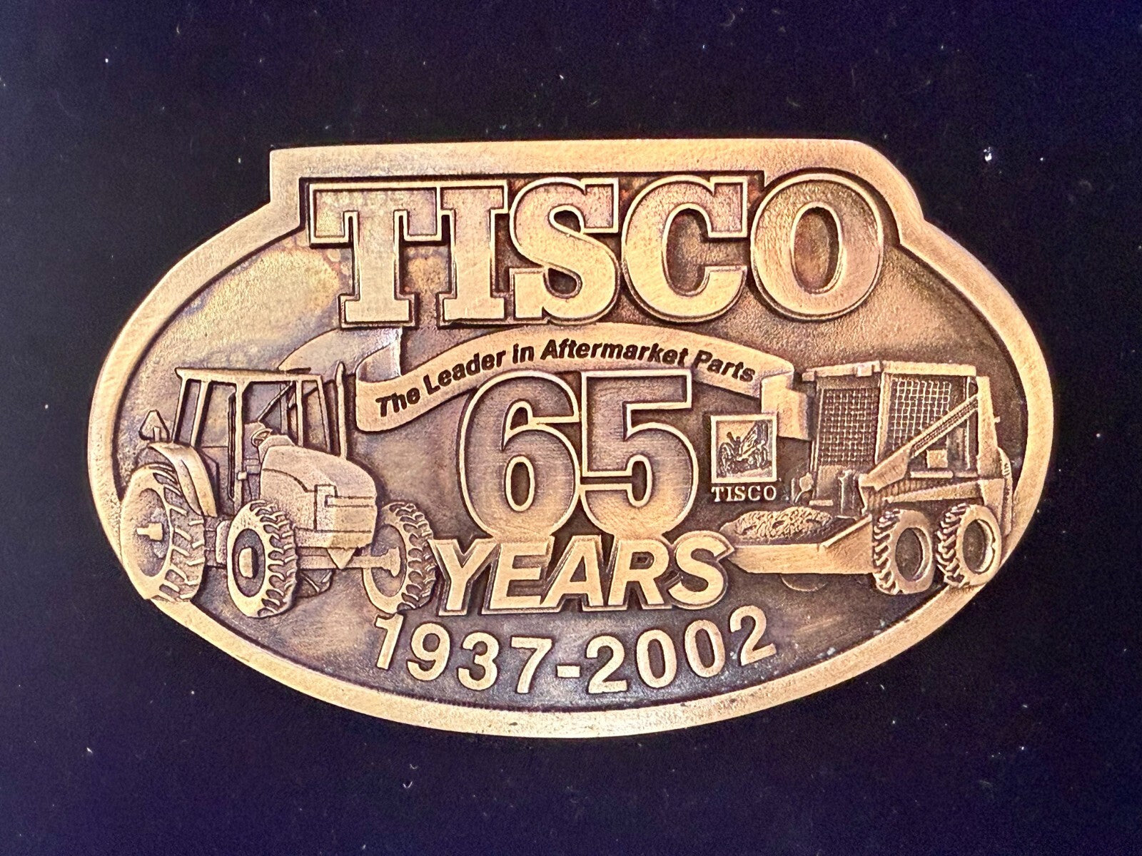 TISCO The Leader in Aftermarket Parts 65 Years 1937-2002 SPEC-CAST Belt Buckle