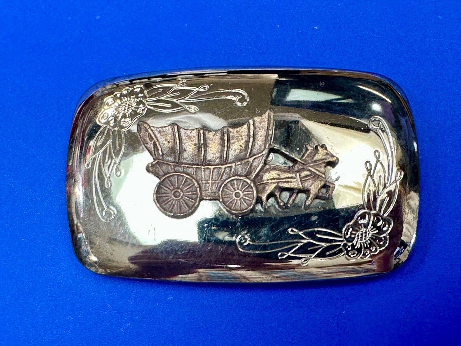 Vintage Horse Drawn Covered wagon on reflective western two tone belt buckle