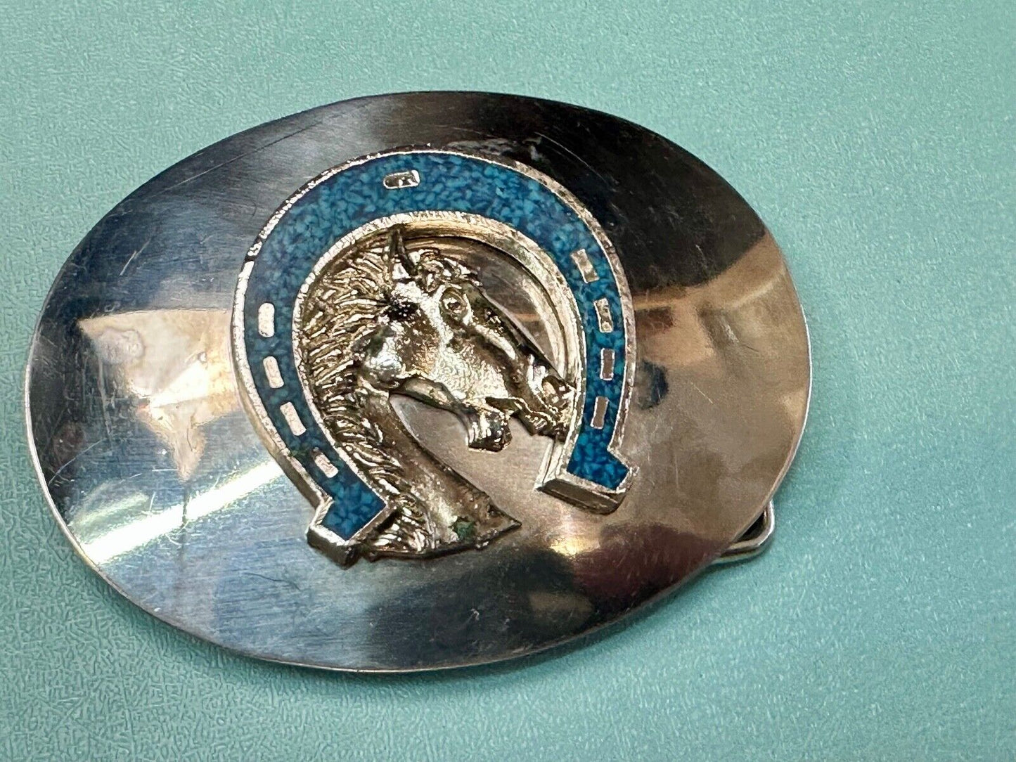 Vintage horse head bust in turquoise chip horseshoe on western belt buckle