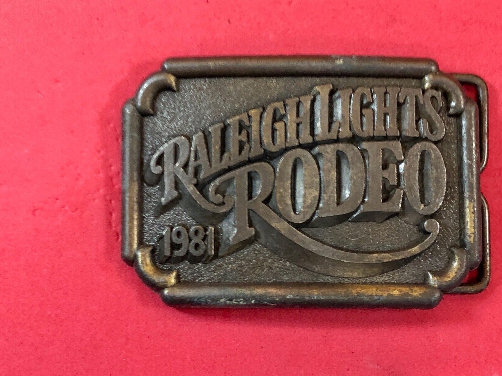  BELT BUCKLE, " RALEIGH LIGHTS RODEO   Cigarette company sponsored event 