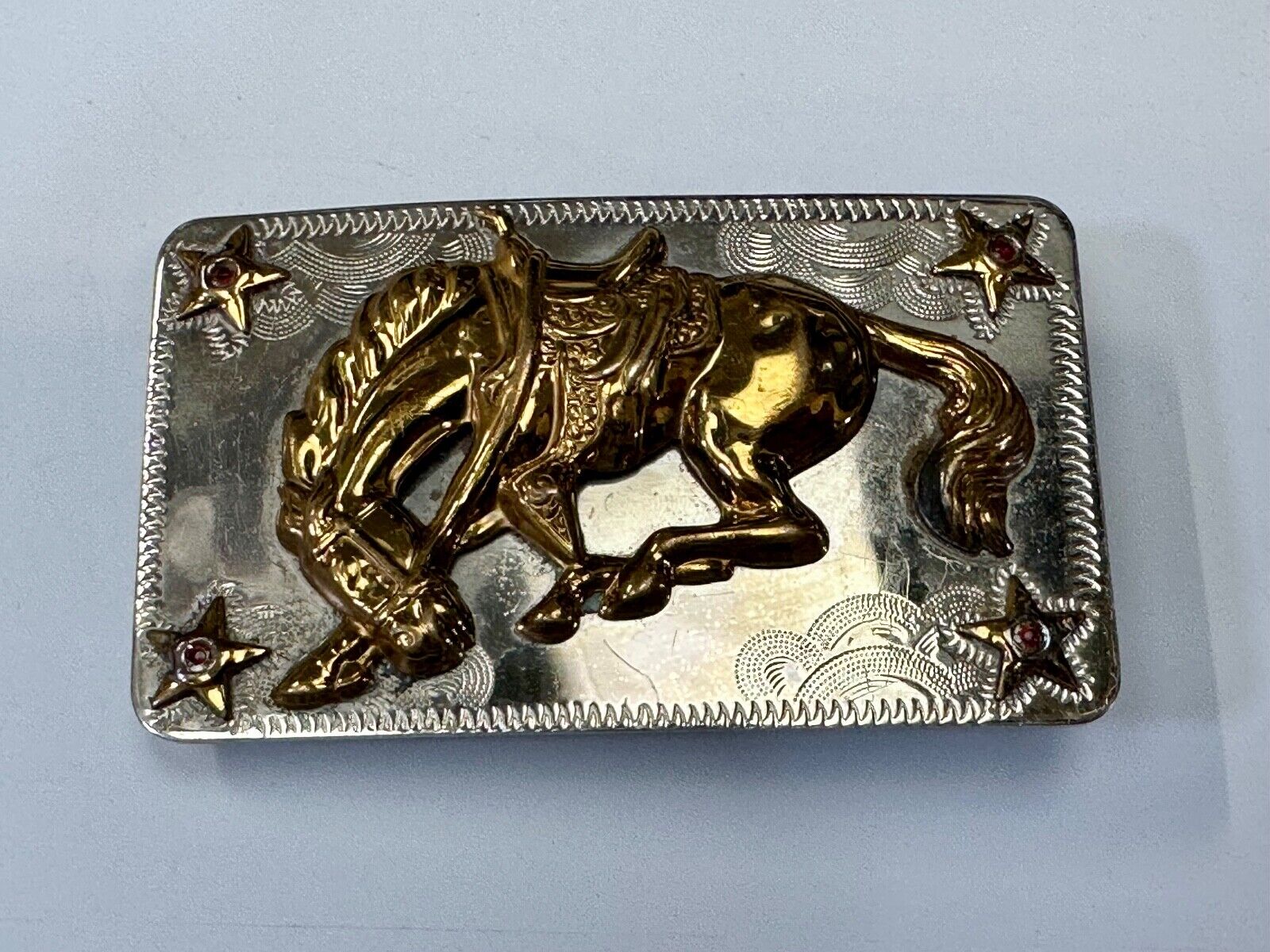 Vintage Horse w/  head down end of the trail Nickel Silver belt buckle w/ Stars