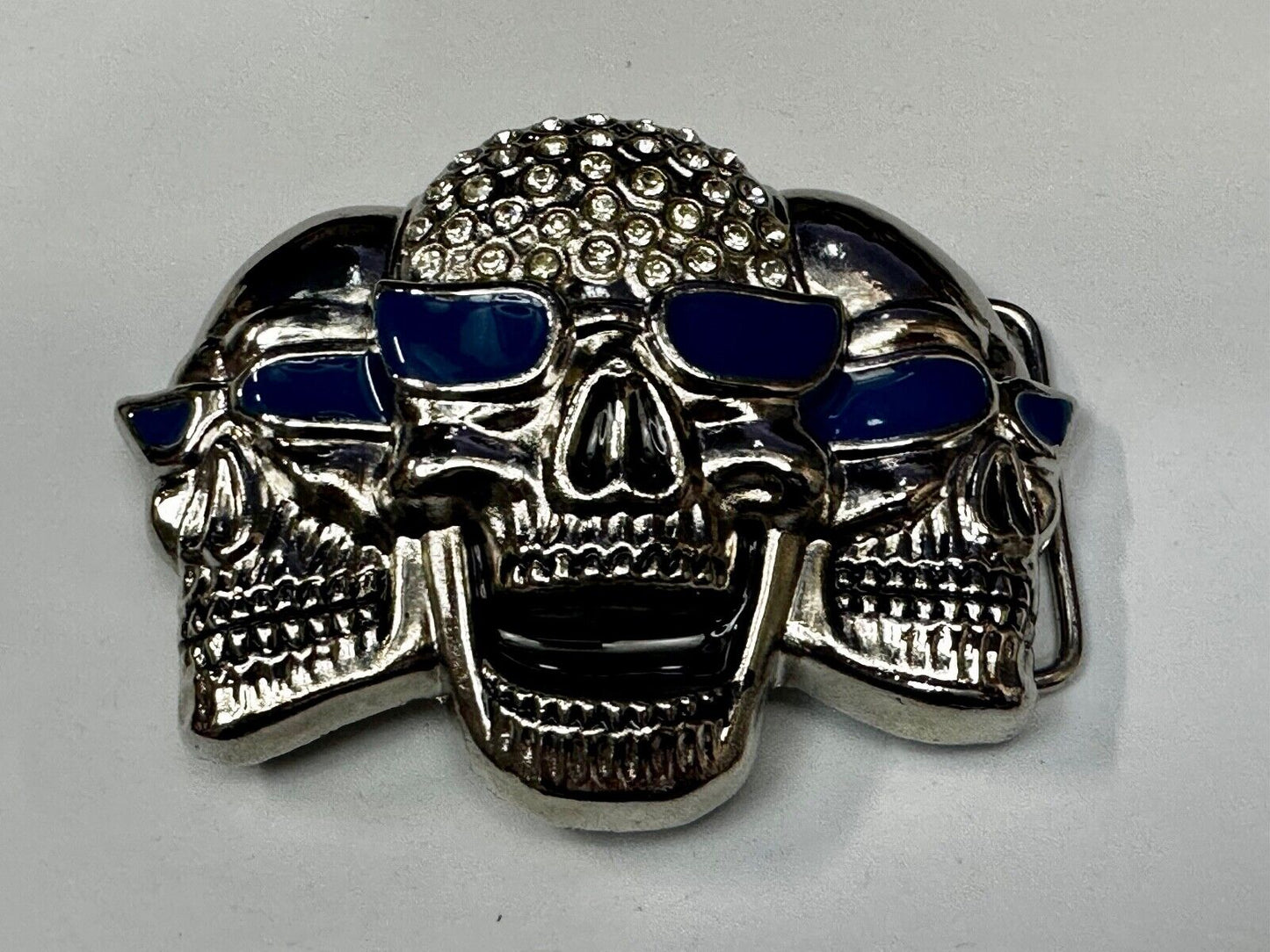 Three Skull's Heads Rhinestone Accented W/ Blue Shades Silver Tone Belt Buckle