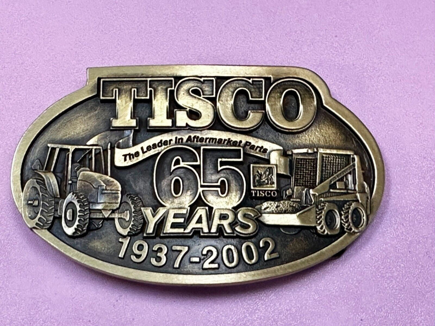 65 Years TISCO 2002 Tractor Implement Supply company NOS Belt Buckle