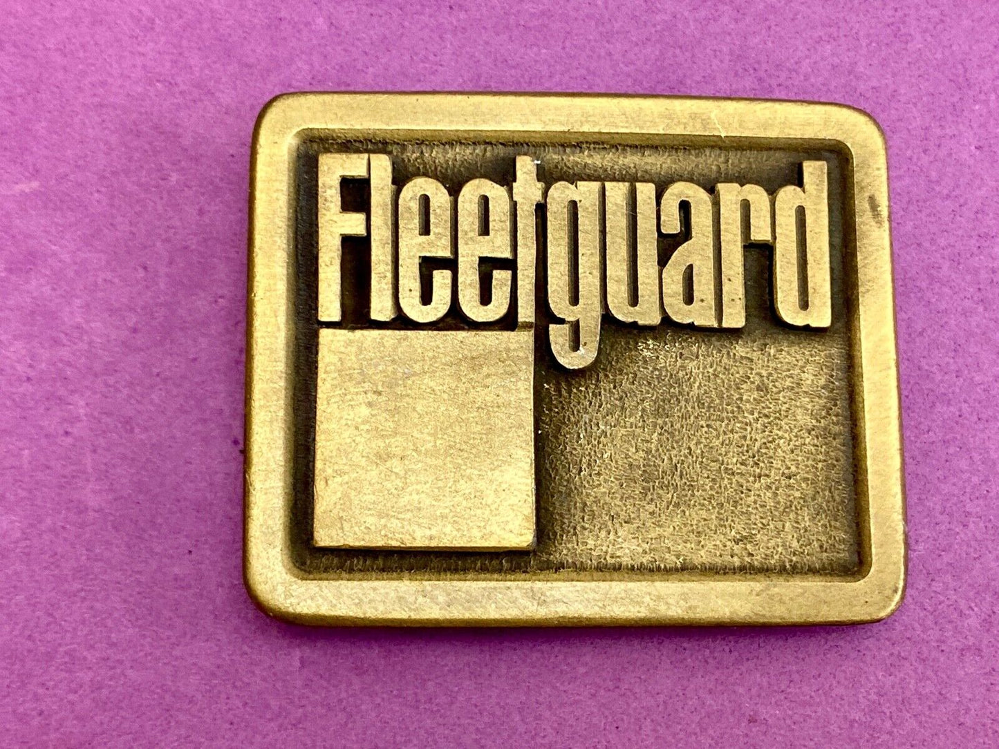 Vintage Fleetguard Construction Equipment Company Advertising Belt Buckle 