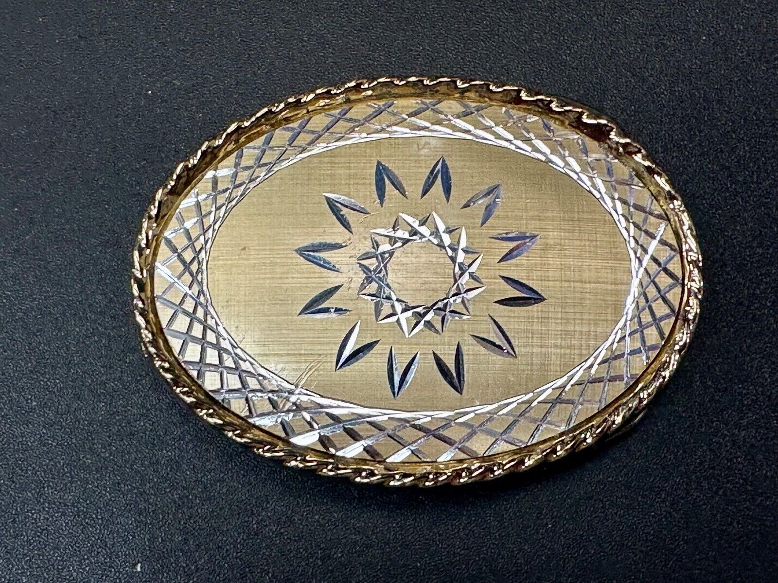 vintage gold tone starburst design oval belt buckle marked W