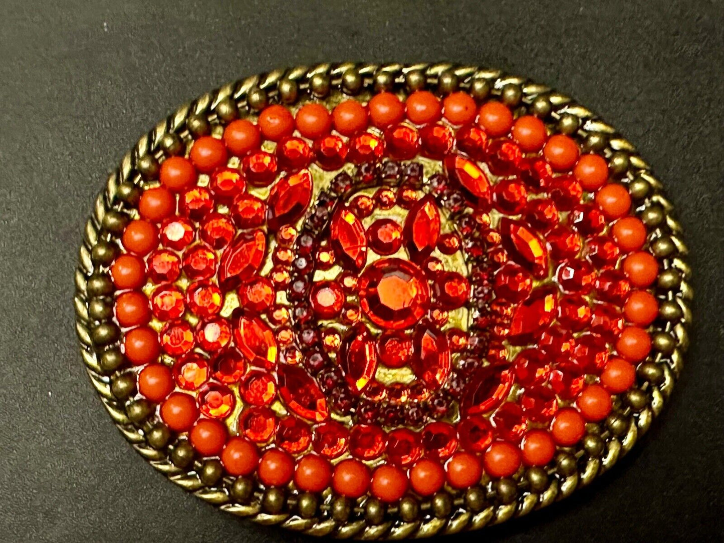 Unique Shades of Red - Mixed Materials oval outlined Belt Buckle