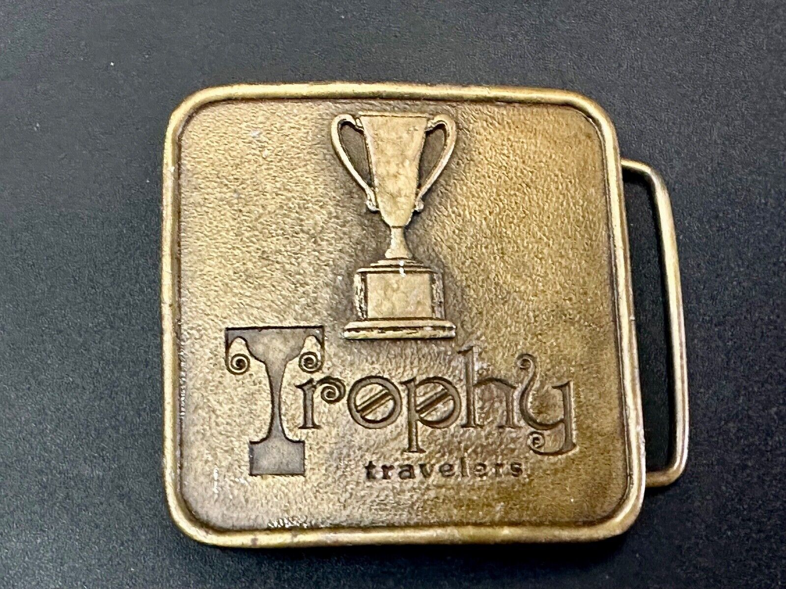 Trophy Travelers vintage Promo Company Advertising MPA 1975 belt buckle