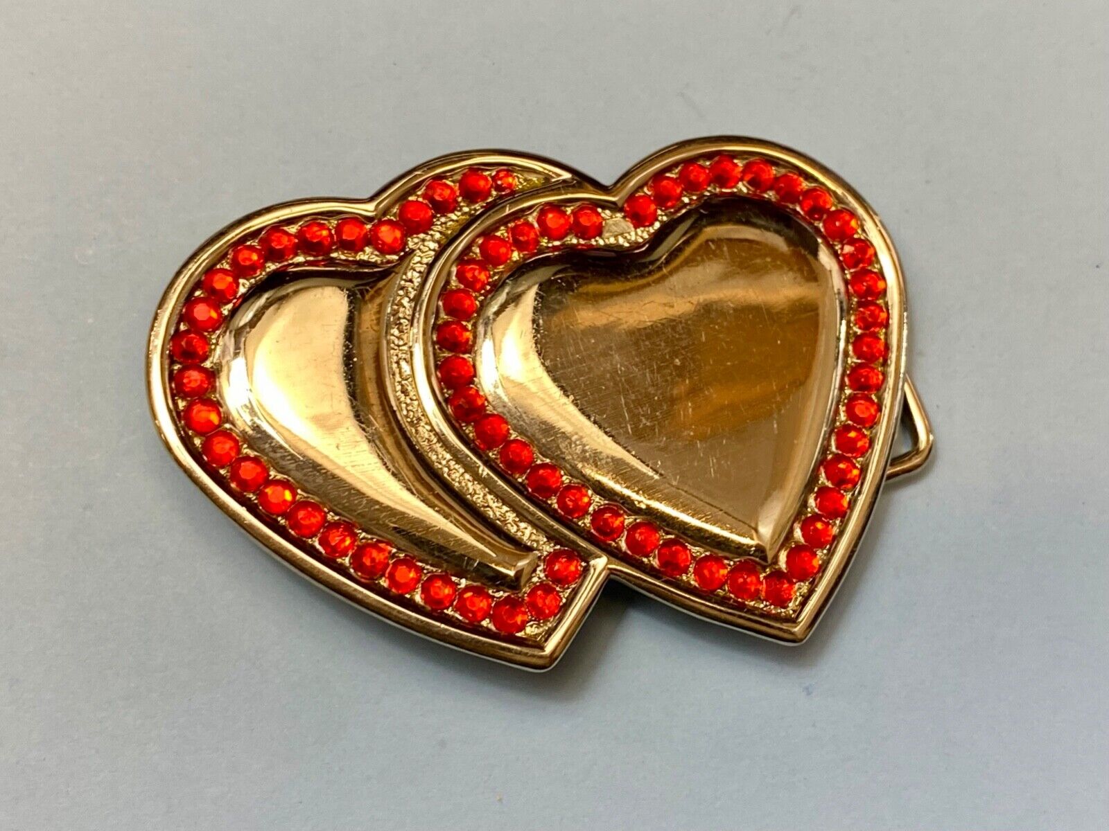 Two Jeweled Hearts Red Rhinestone outlining silver tone cutout belt buckle
