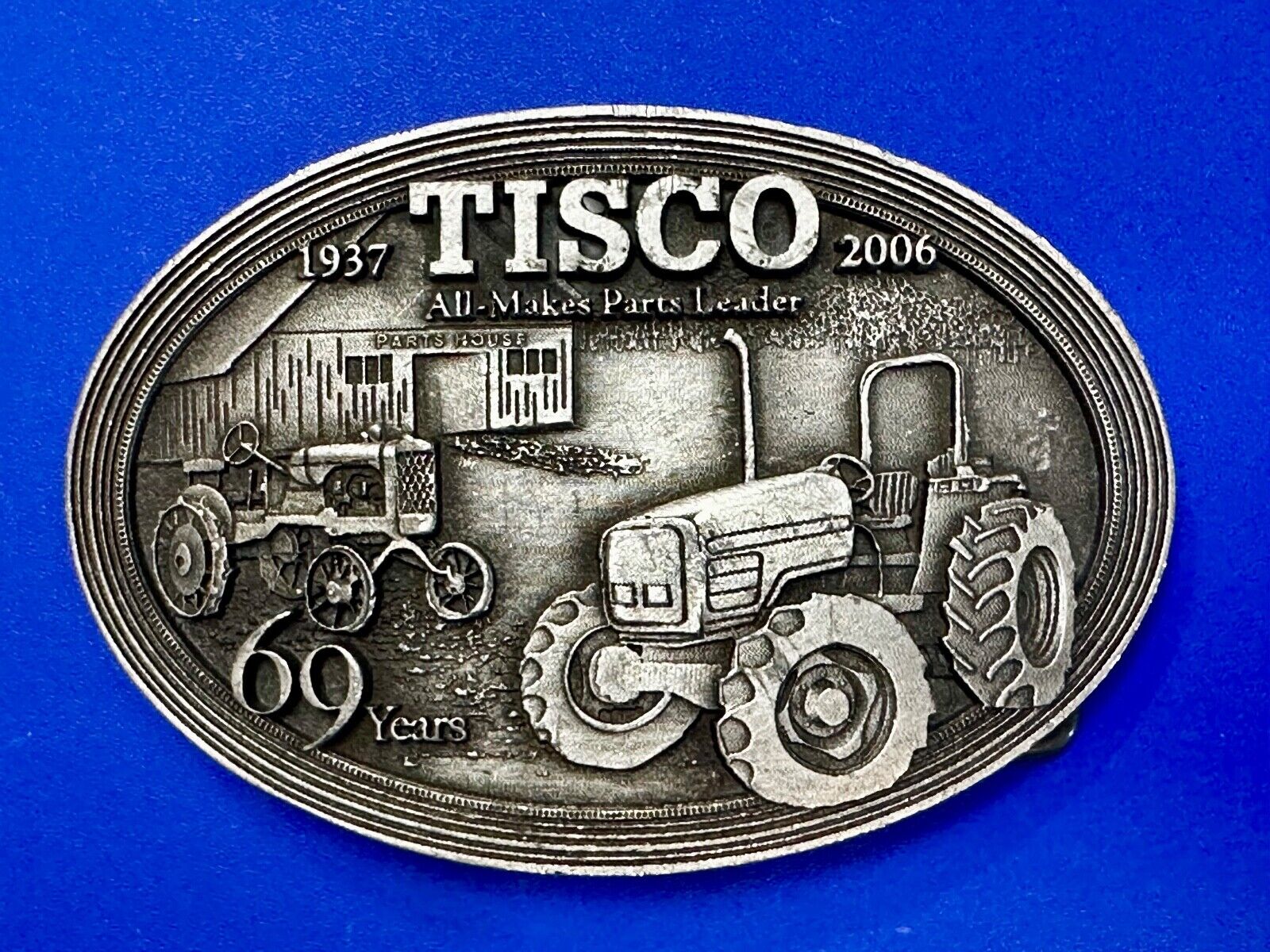 TISCO Tractor Implement Supply Replacement Parts 69 years - 2006 Belt Buckle