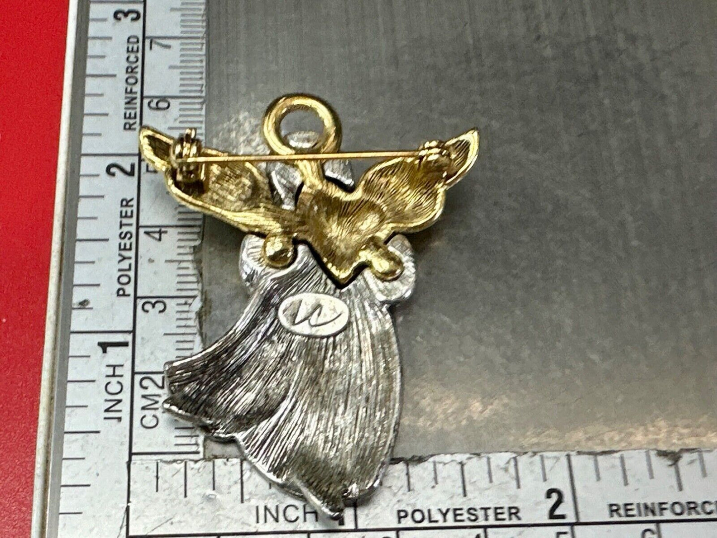 Angle holding heart -vintage two tone LC Liz Claiborne Signed Brooch Pin