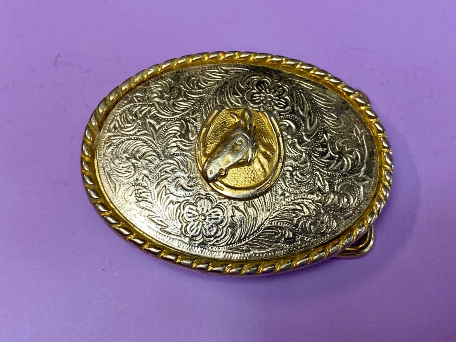 Vintage horse head inside of lucky horseshoe two toned western belt buckle