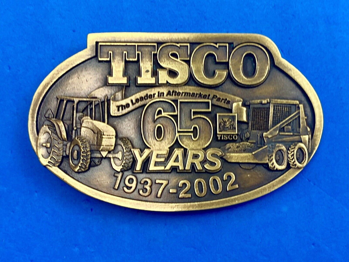65 years - Tisco Tractor Implement Supply Spec Cast Farming Belt Buckle 