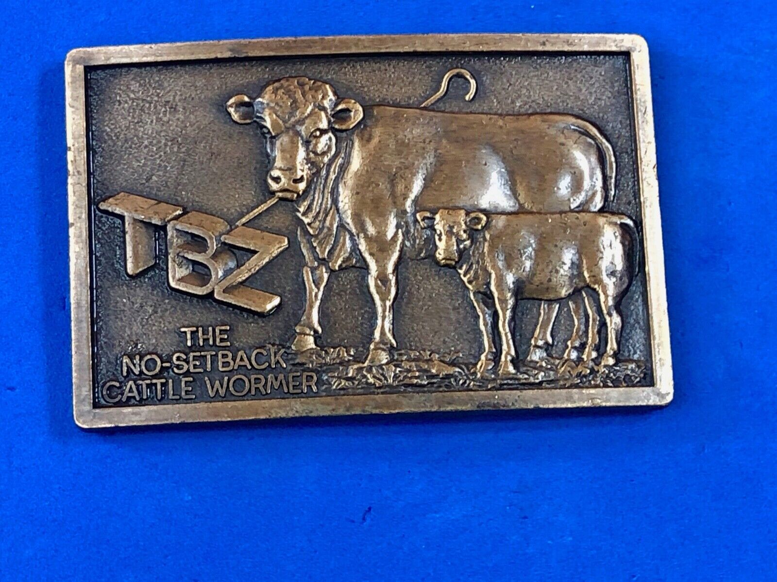 Vintage Farmers TBZ The No Setback cattle wormer belt buckle 