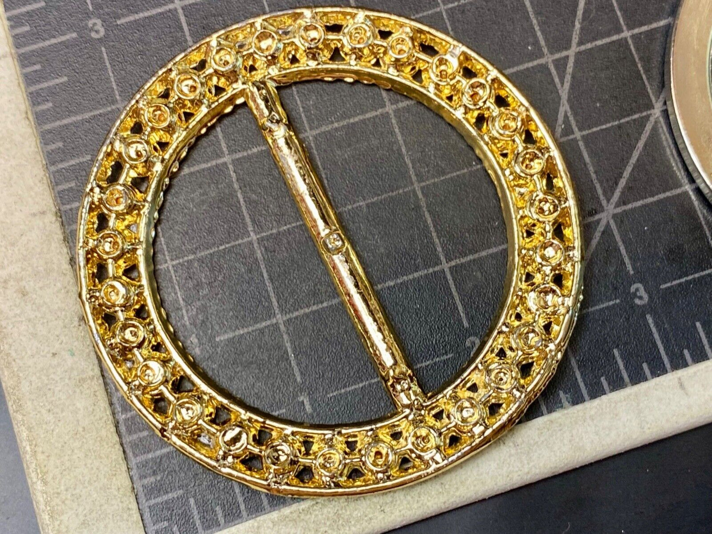 Two piece lot of antique Rhinestone covered round scarf slides