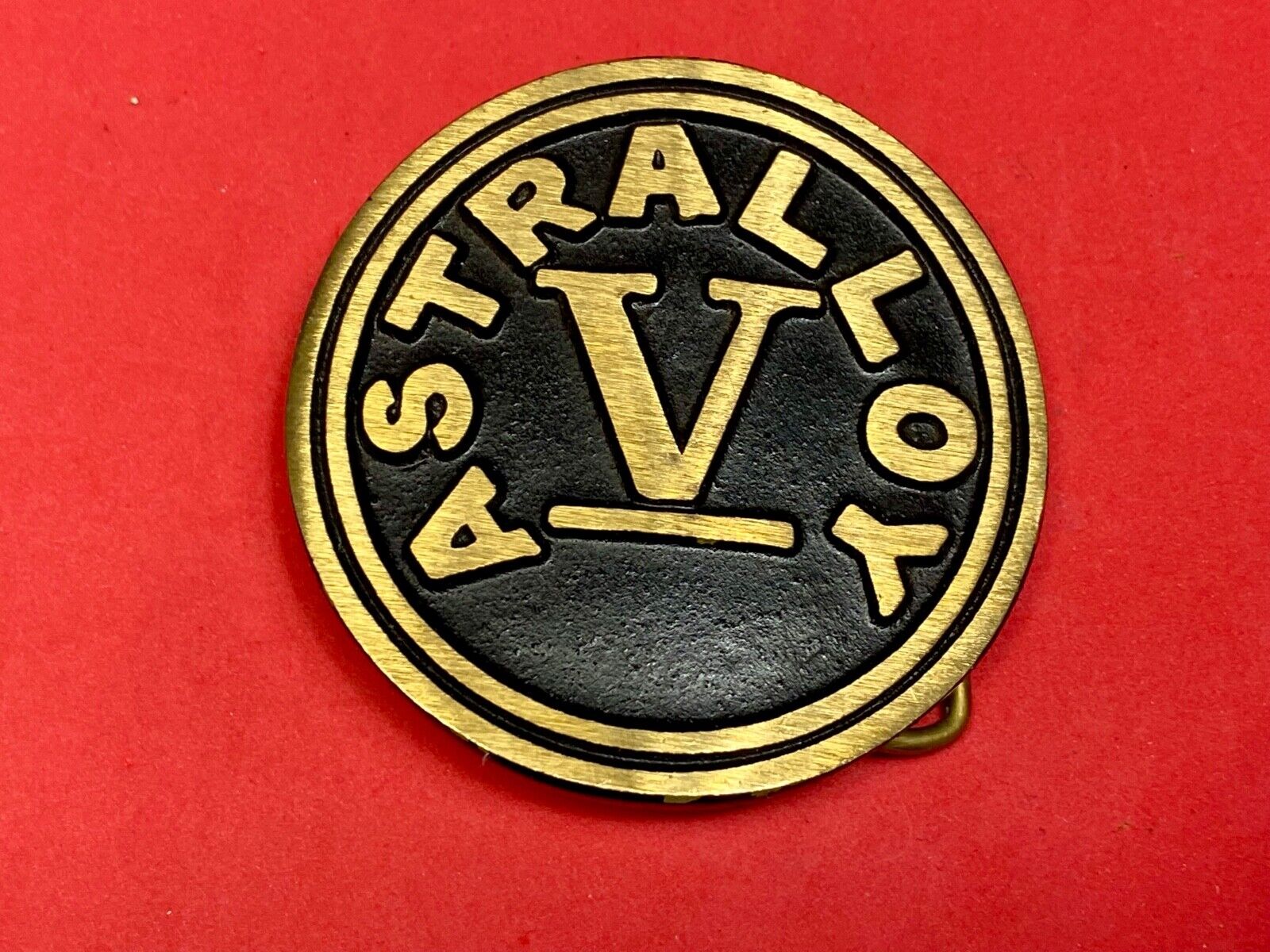 Astralloy Vis a unique, deep-air hardened steel promotional brass belt buckle 