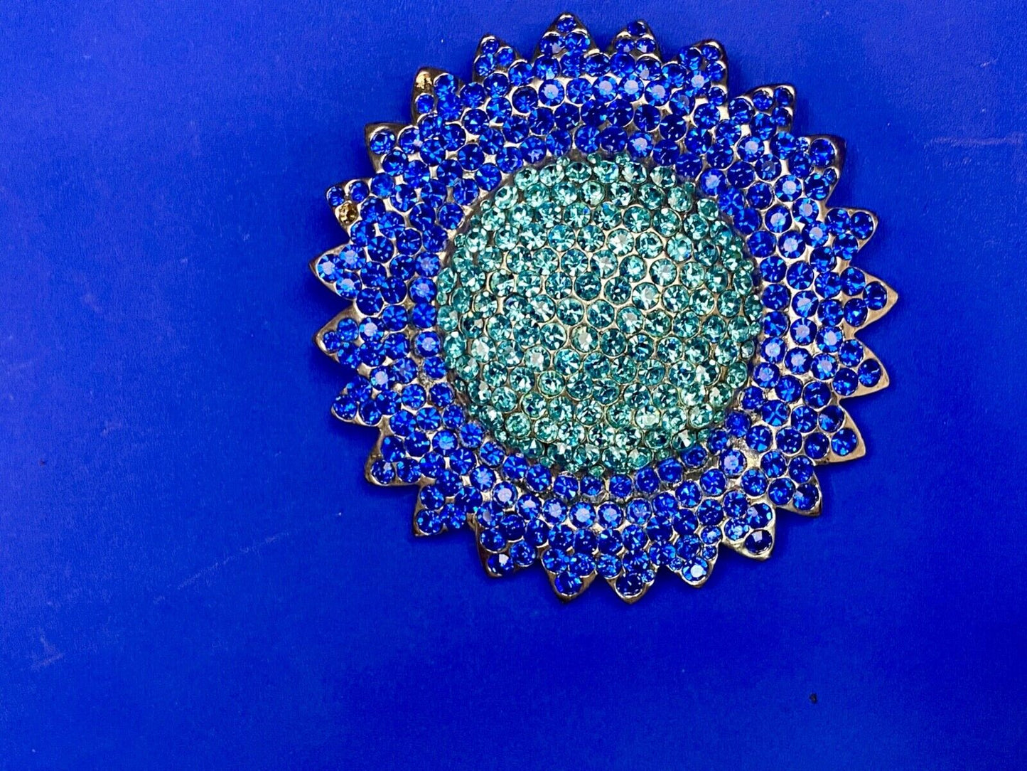 A Blue Green Sea Of Rhinestones - Starburst Cutout Belt Buckle