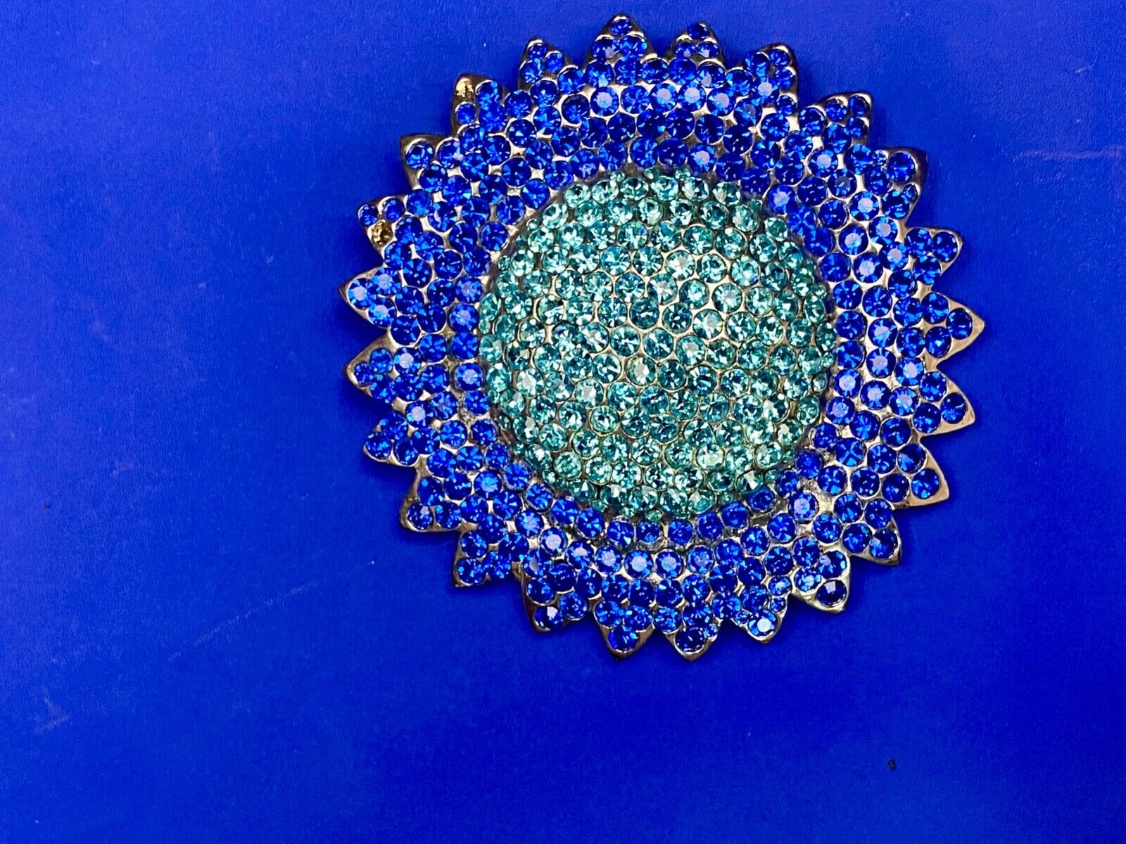 A Blue Green Sea Of Rhinestones - Starburst Cutout Belt Buckle
