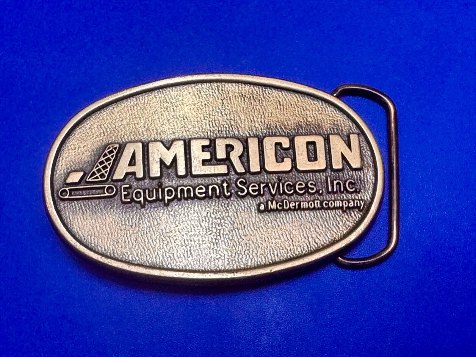 American Equipment services inc - McDermor Company Promotional belt buckle