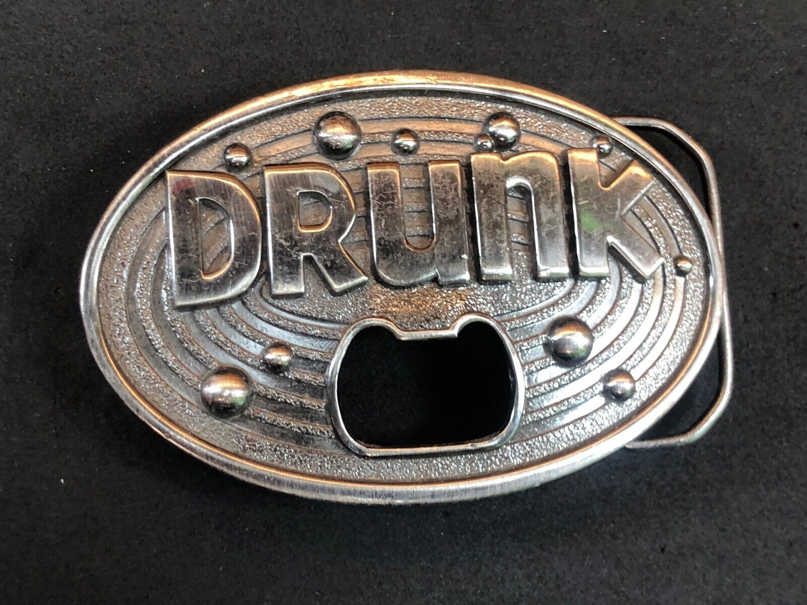 vintage large metal Bottle Opener / belt buckle - words DRUNK   Beer glass party