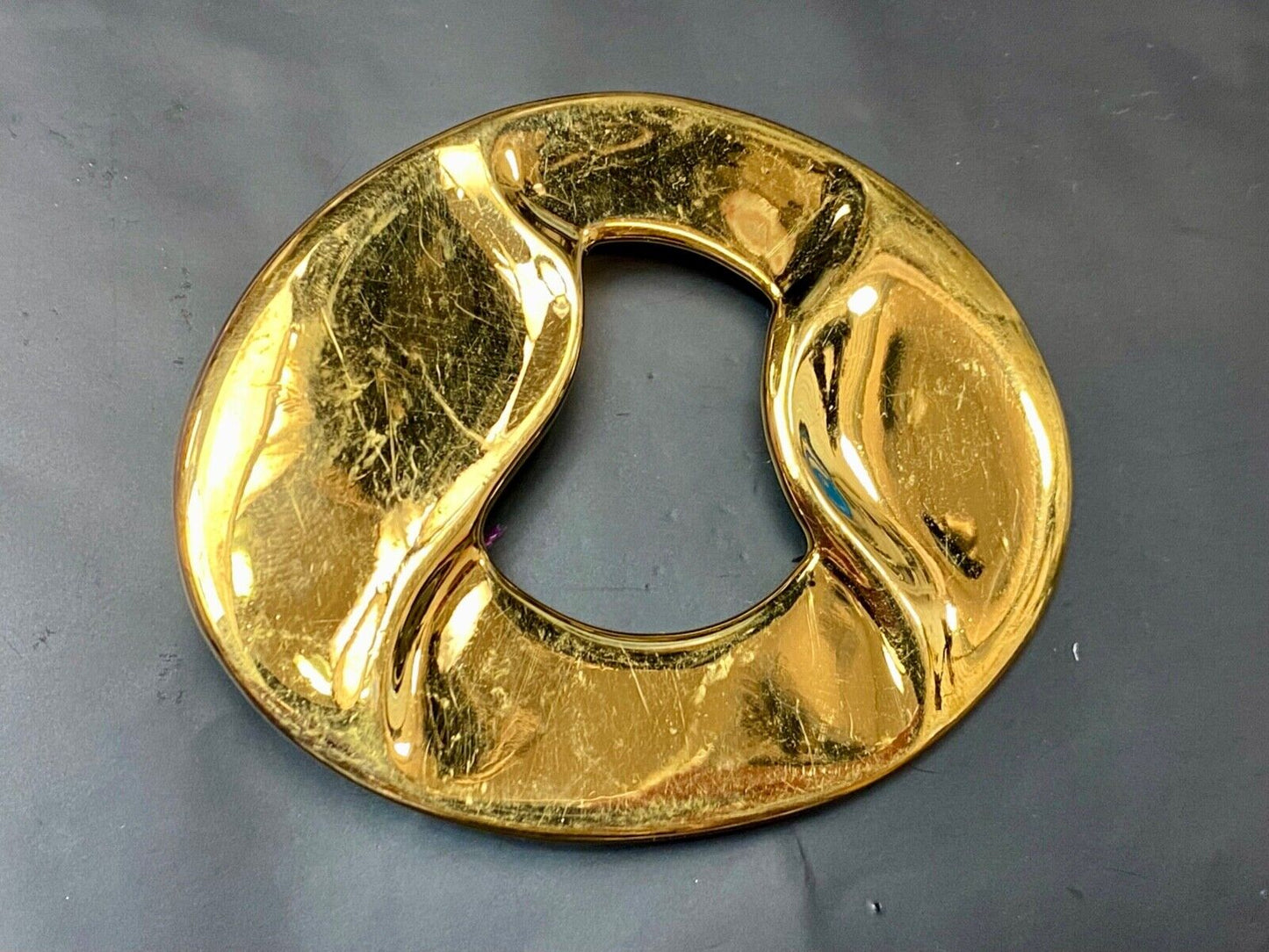 Artist Ginnie Johansen signed gold color abstract oval belt scarf slide
