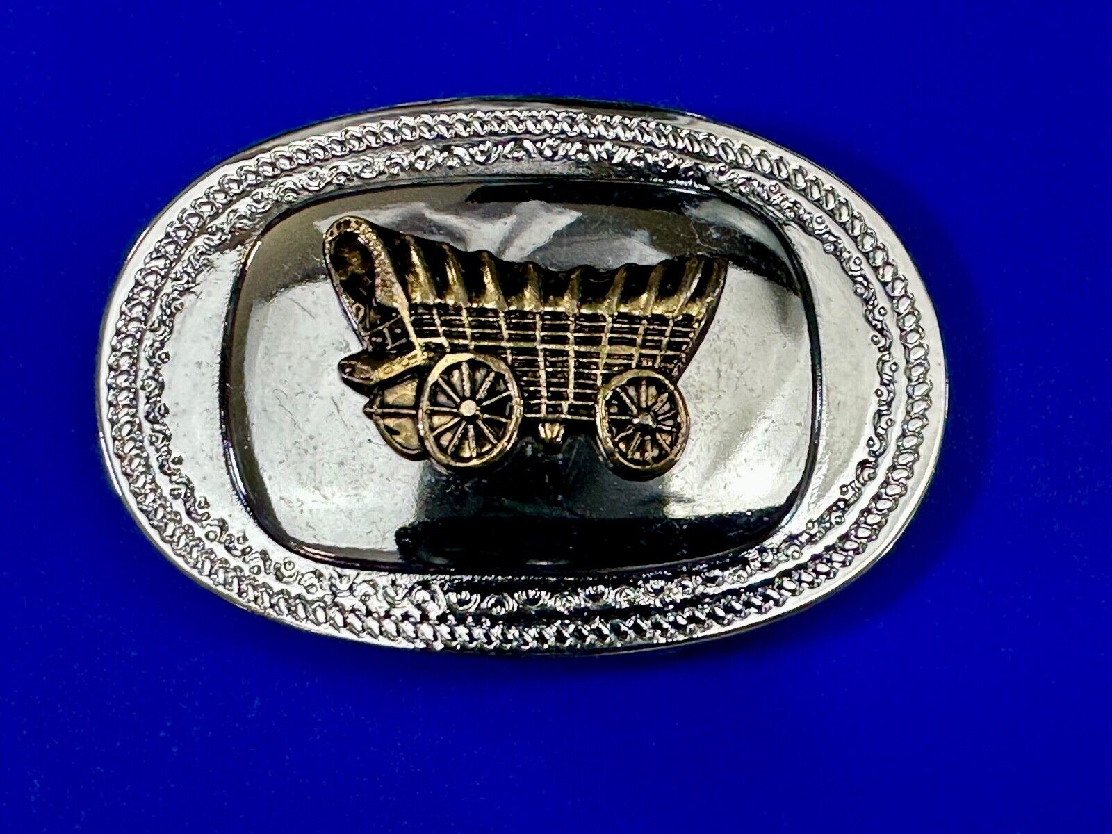 Vintage Covered Wagon - western two tone outlined belt buckle