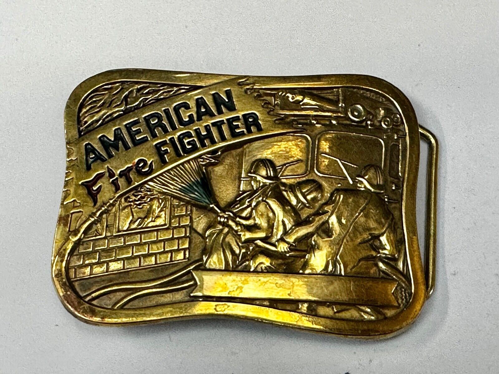 American Firefighters at work putting out fire Vintage 1981 Baron Belt Buckle