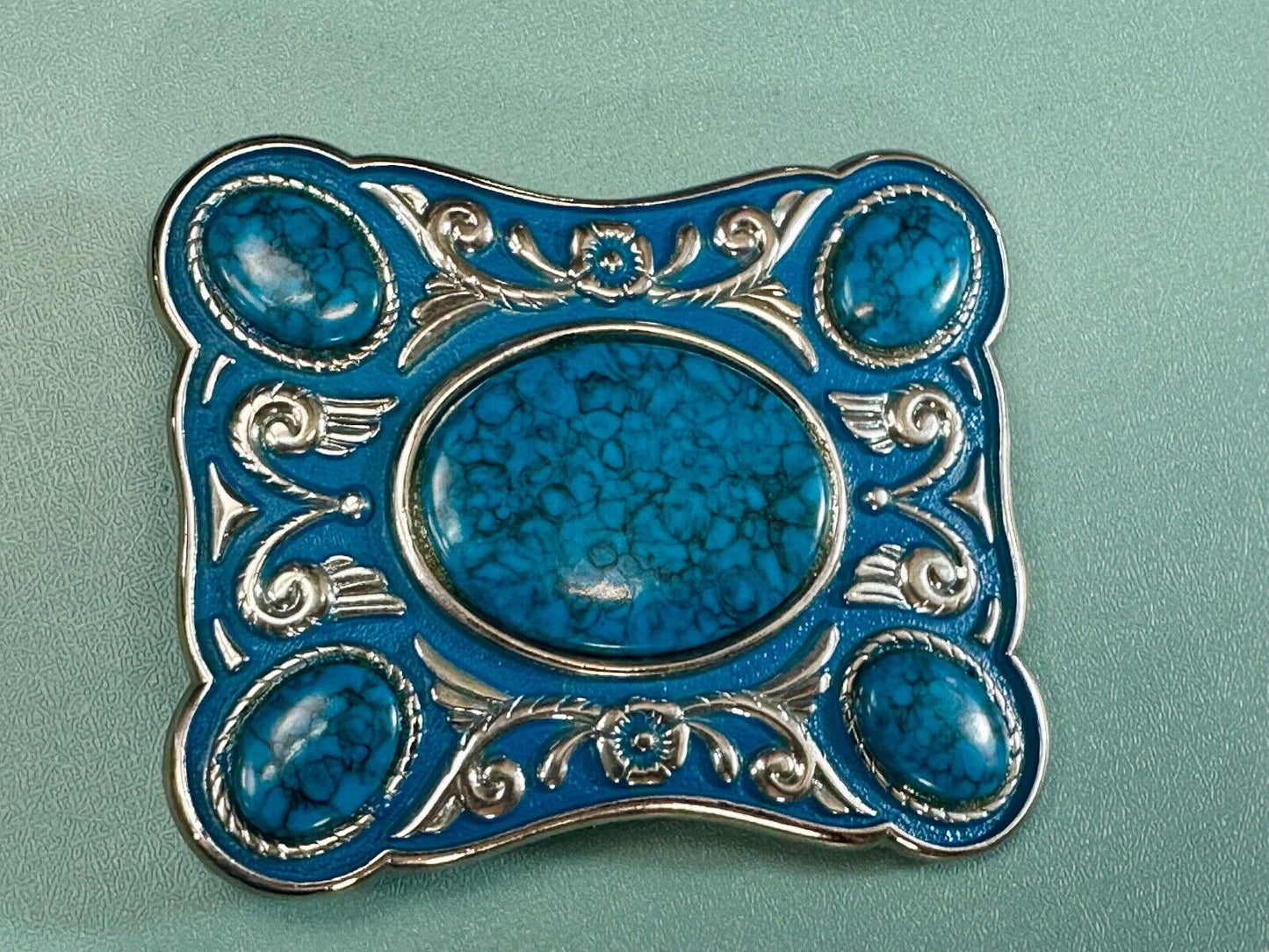 Turquoise Colored Cabochon Stones on Silver Tone Southwestern belt buckle