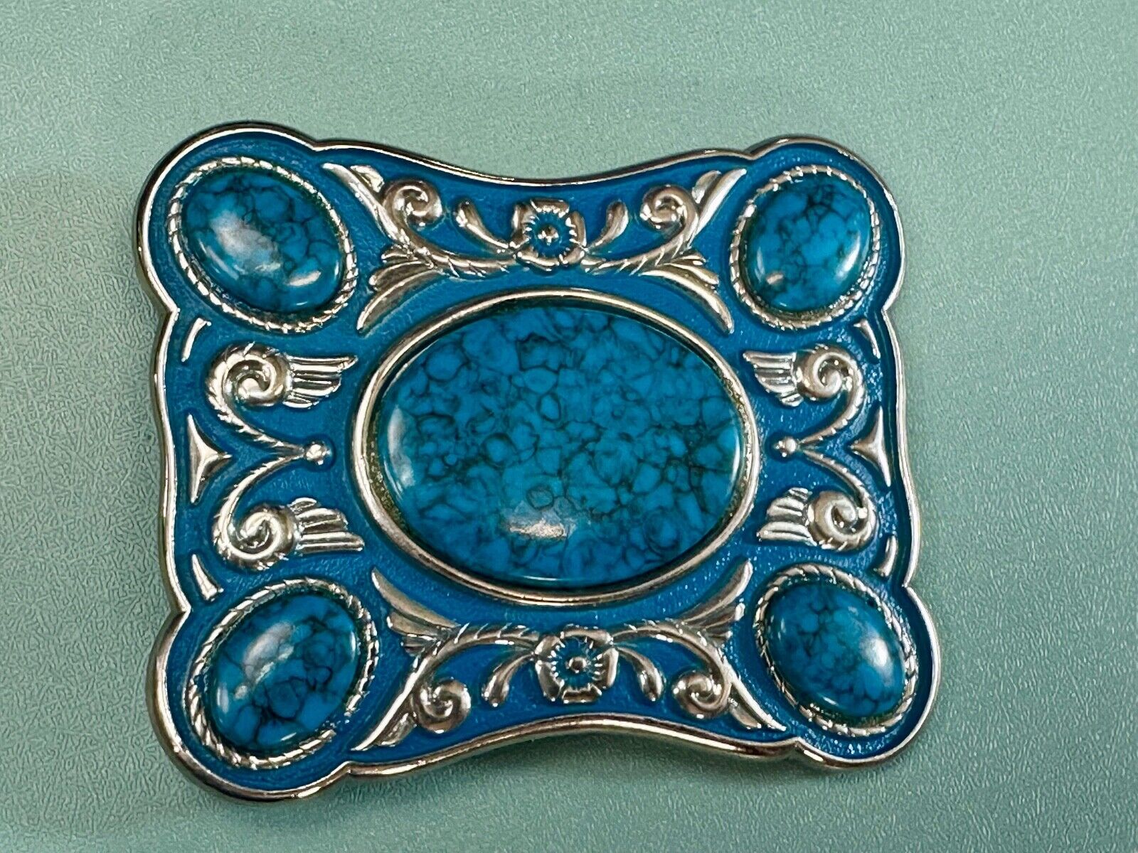 Turquoise Colored Cabochon Stones on Silver Tone Southwestern belt buckle