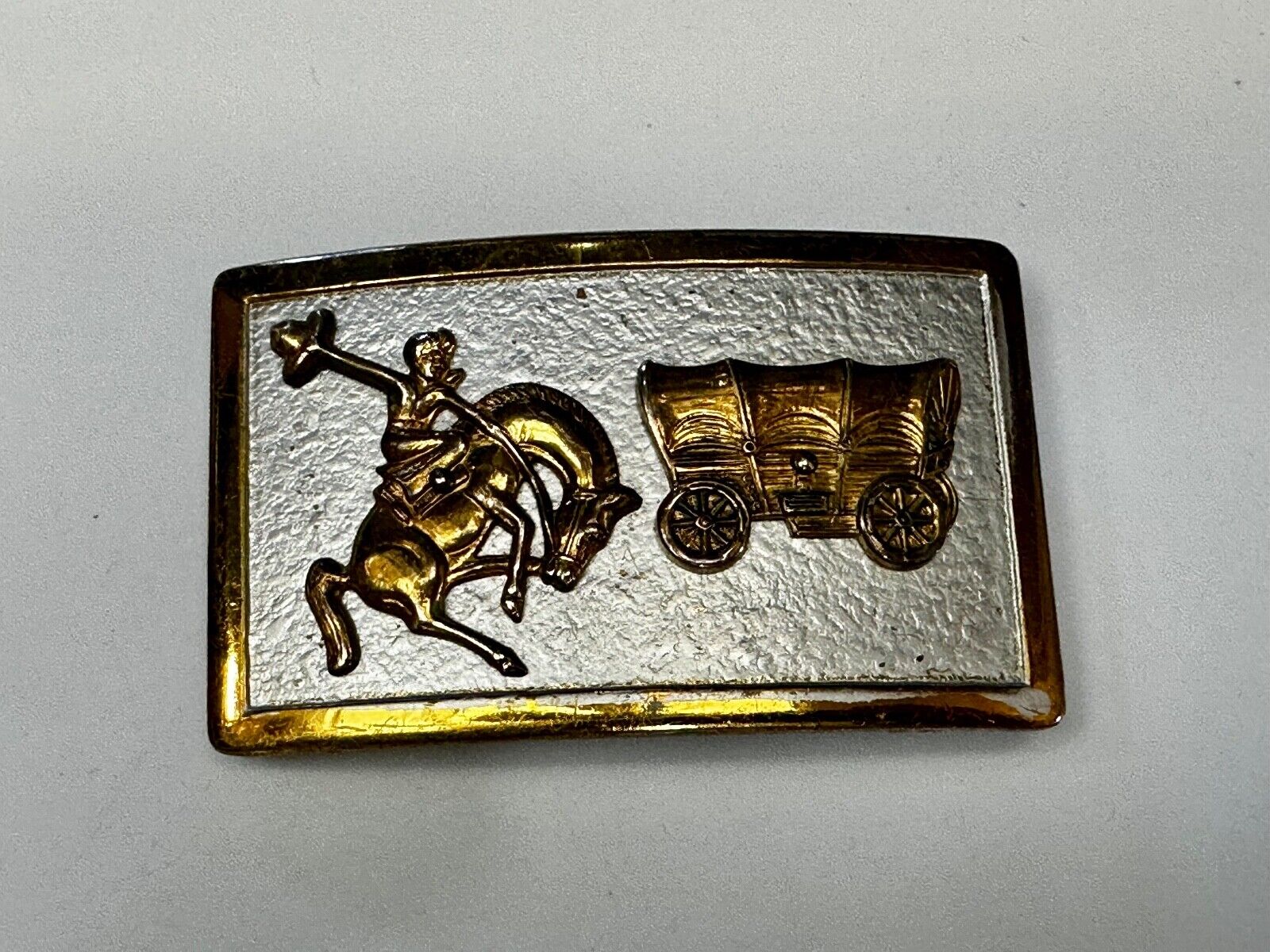 Vintage Cowboy Saddle Bronc western Covered wagon gold tone belt buckle