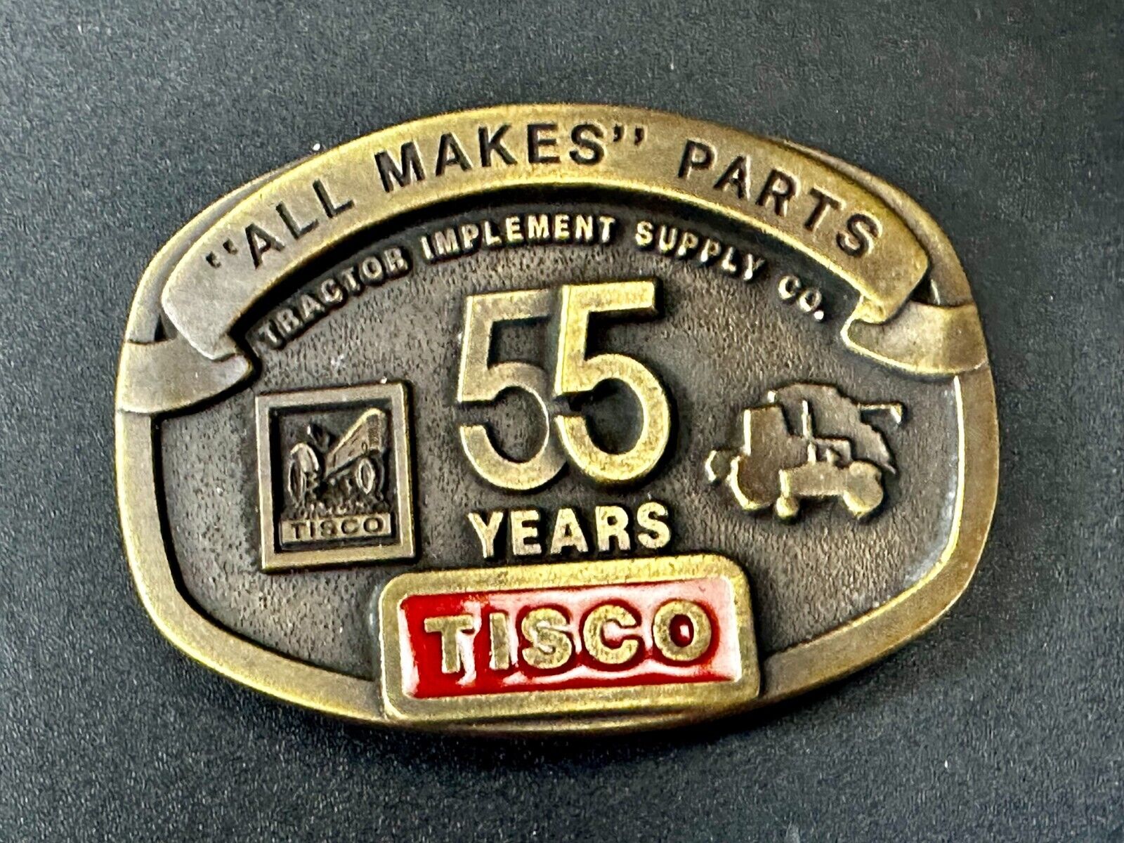 TISCO 55 Years -  All Makes Parts NOS  Tractor Implement Supply Belt Buckle
