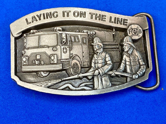 Vintage 1992, Laying it on the line fire department pewter belt buckle 