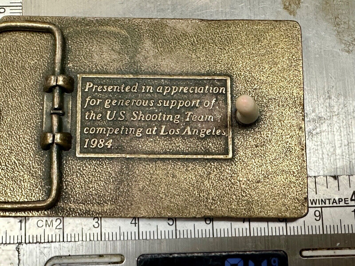 Aiming for Olympic gold - Los Angeles 1984 US shooting Team belt buckle