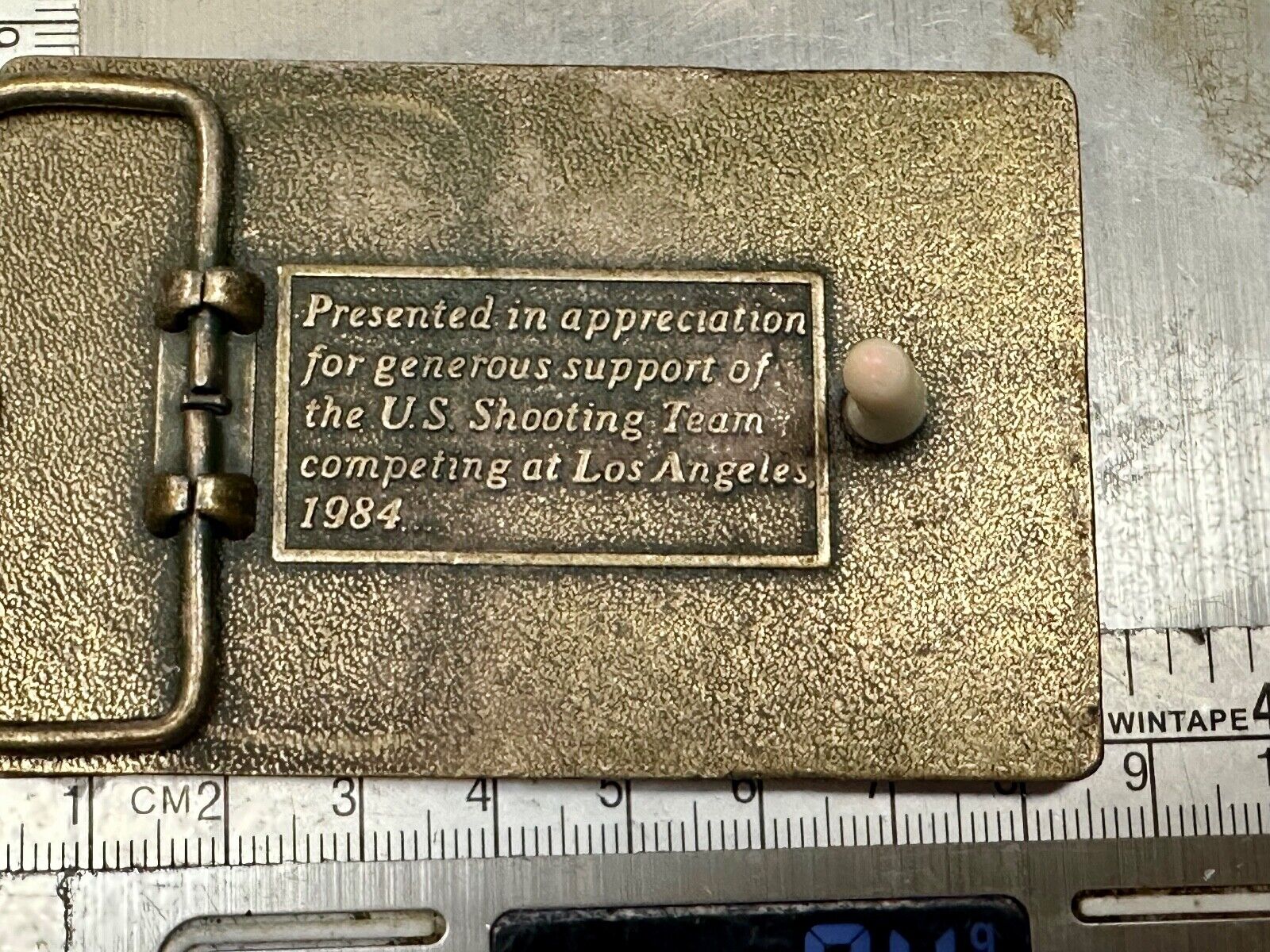 Aiming for Olympic gold - Los Angeles 1984 US shooting Team belt buckle