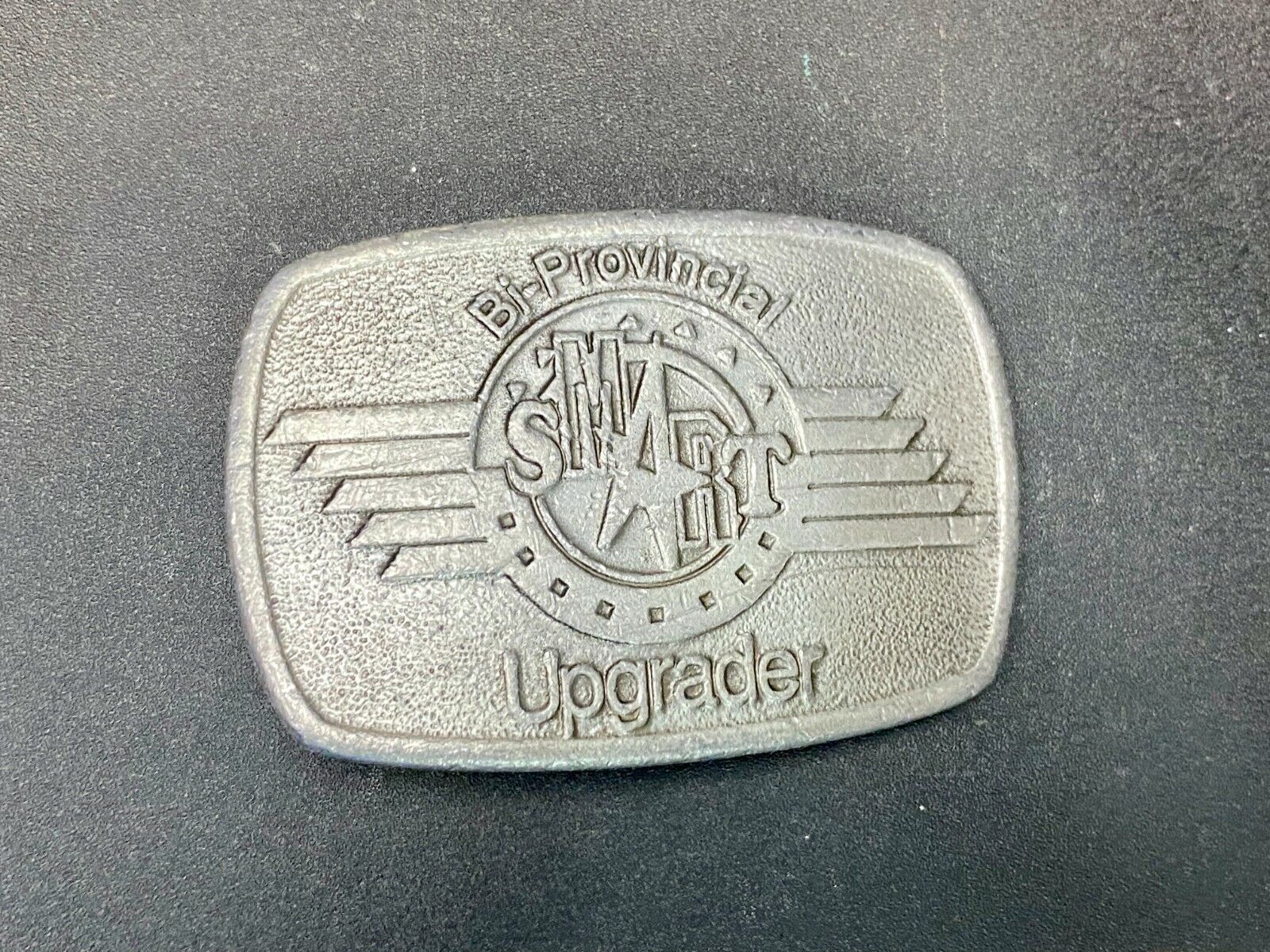 Bi-Provincial Smart Sm Art Upgrader Belt Buckle By Ad Ventures Studios