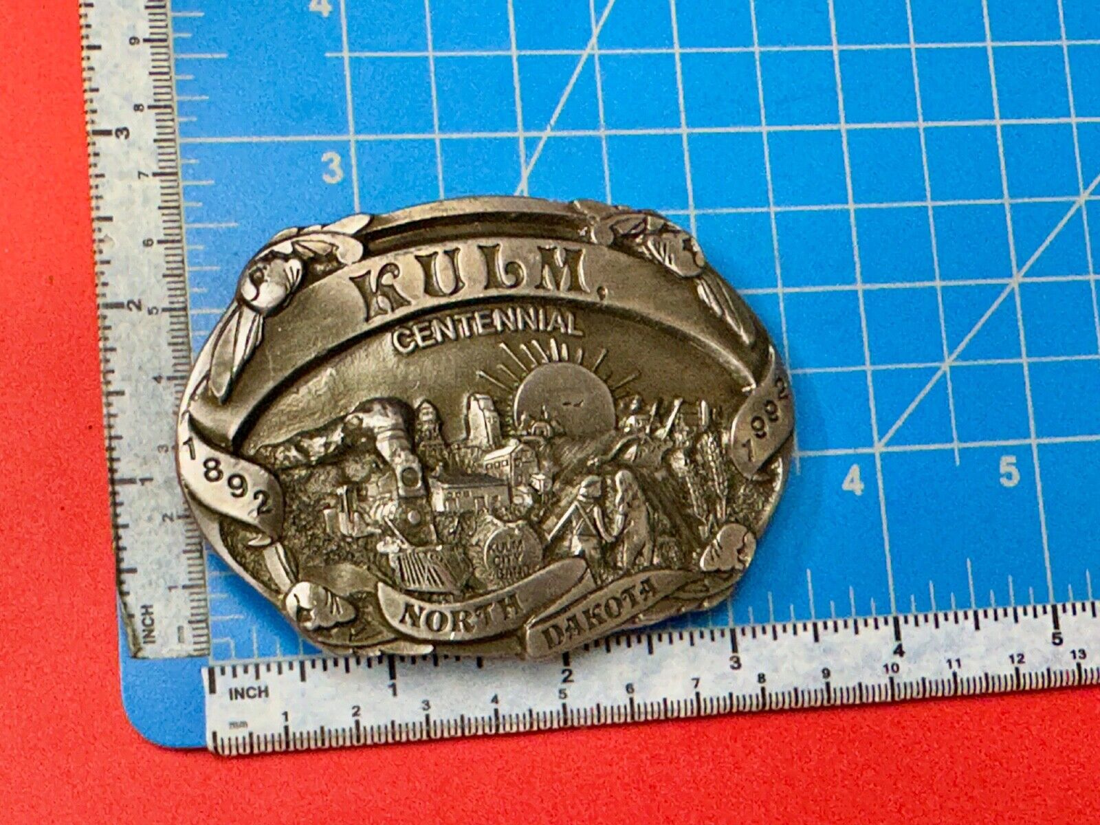 Vintage KULM North Dakota commemorative belt buckle by DART inc.