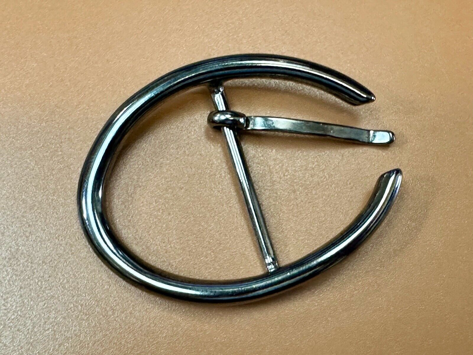 unique open oval black colored dress style belt buckle