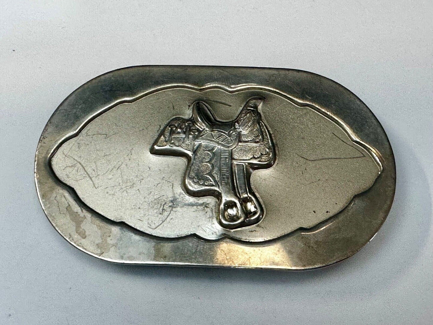 Vintage horse saddle used Belt Buckle to restore