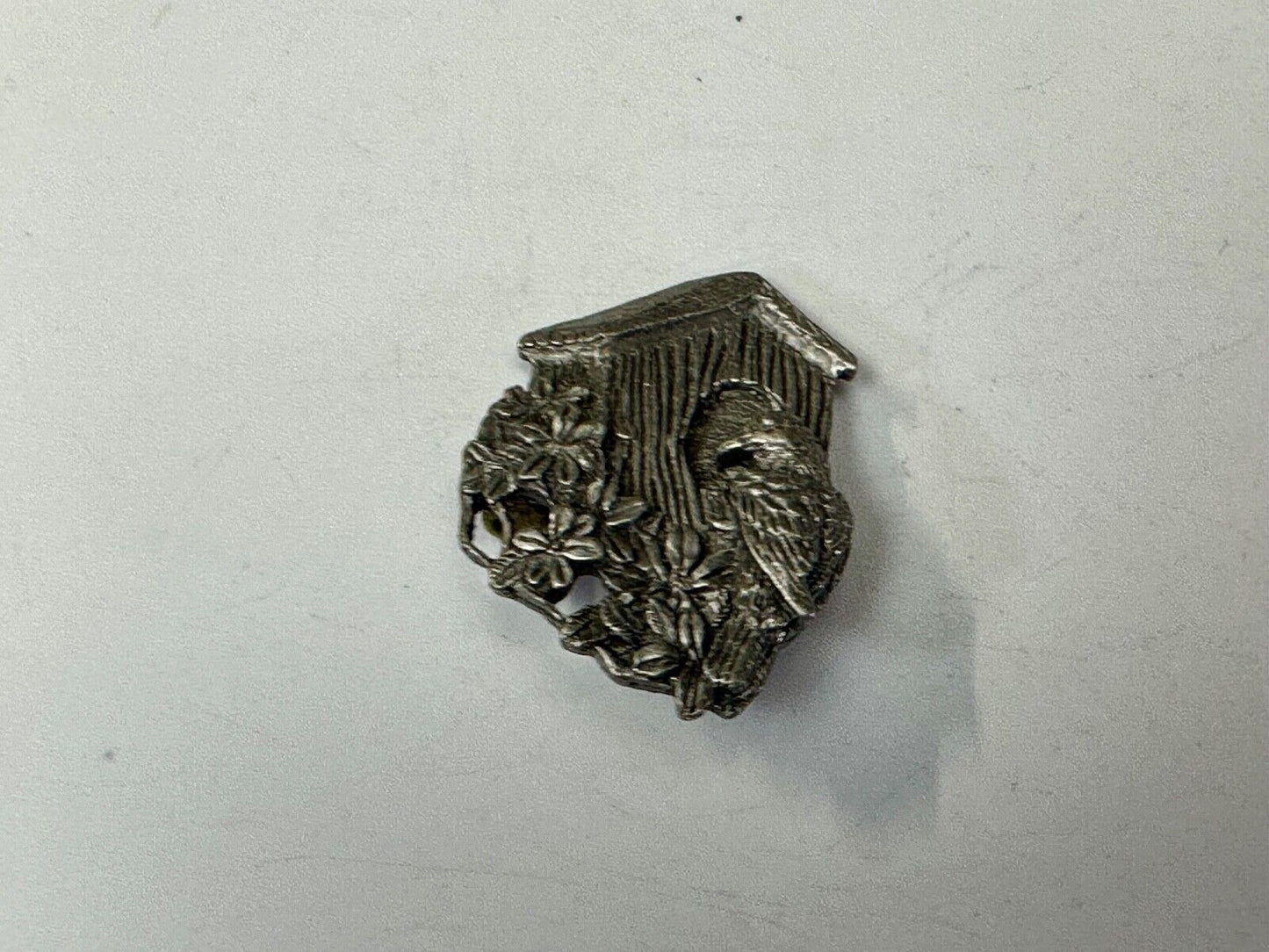 Bird flying to birdhouse - vintage birds and blooms pewter pin