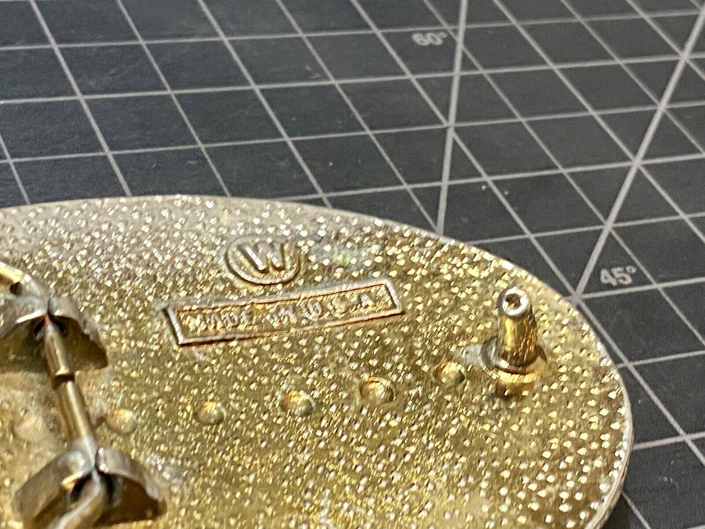 A custom Pimped out retro 70's Car - a caddy? on a western belt buckle signed W!