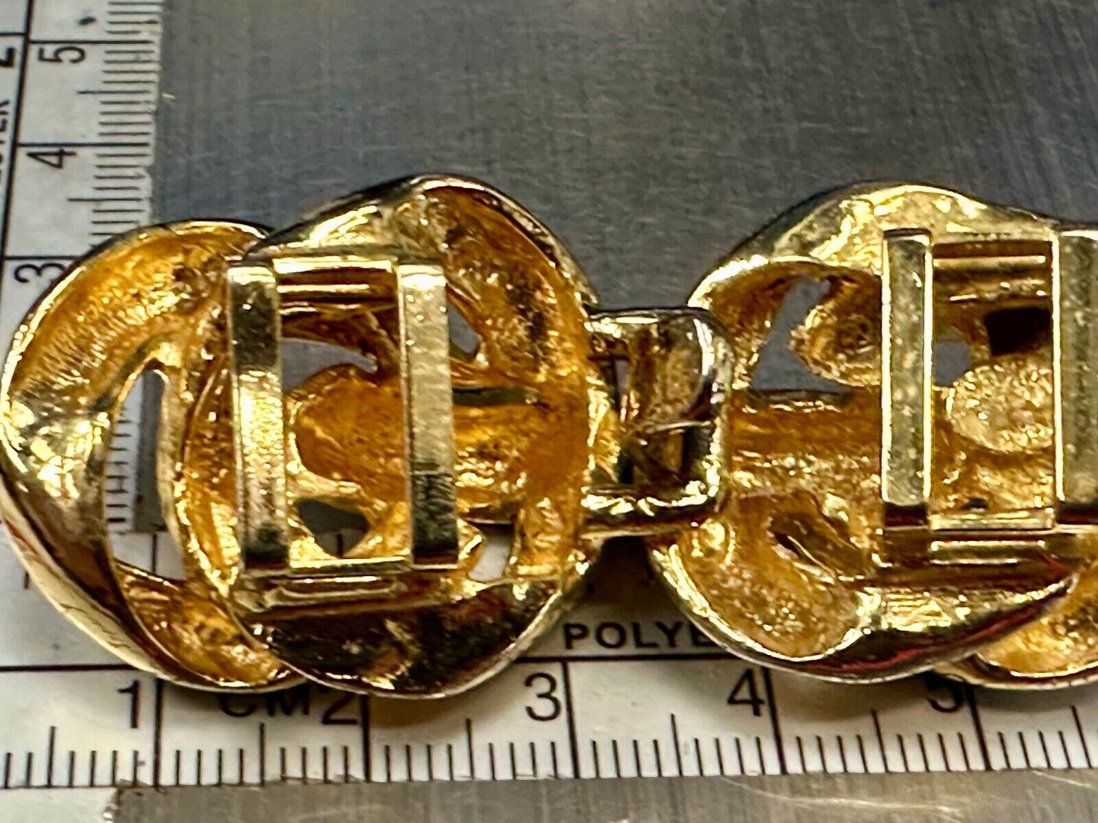 Twisted Knot's ! Two-piece interlocking gold tone Gay Boyer Vintage belt buckle