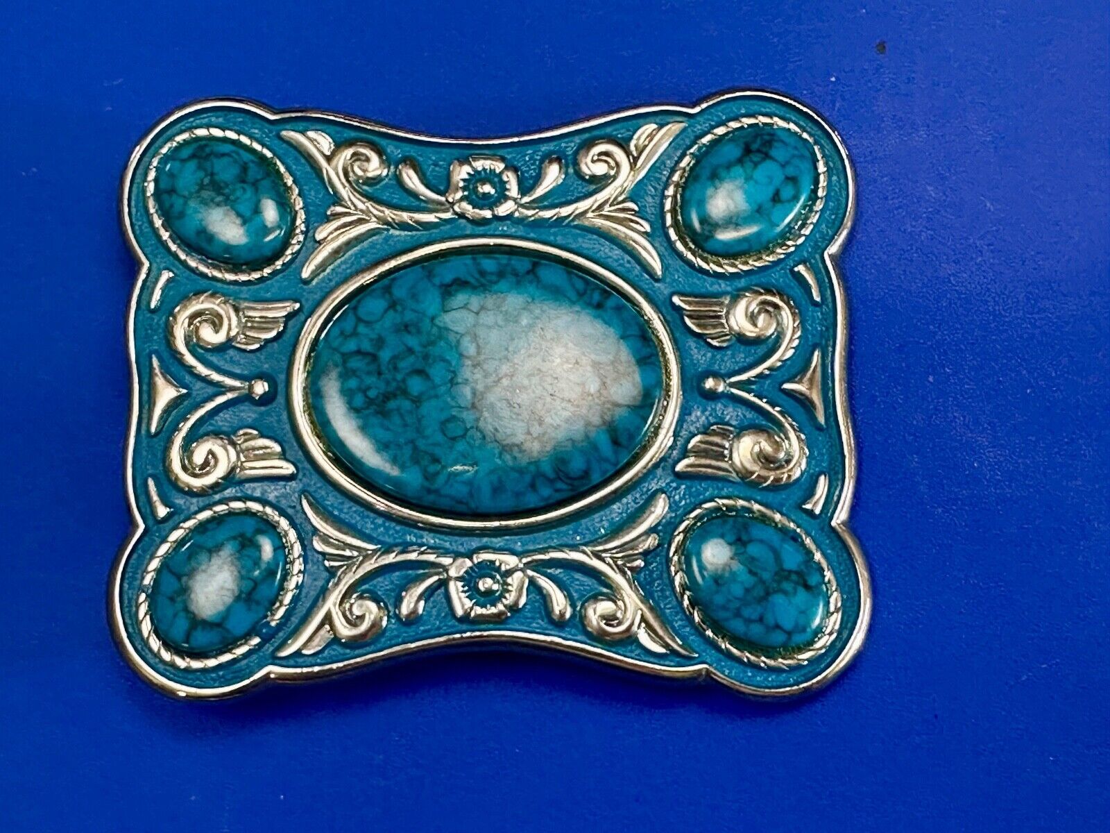 Turquoise Colored Cabochon Stones on Silver Tone Southwestern belt buckle